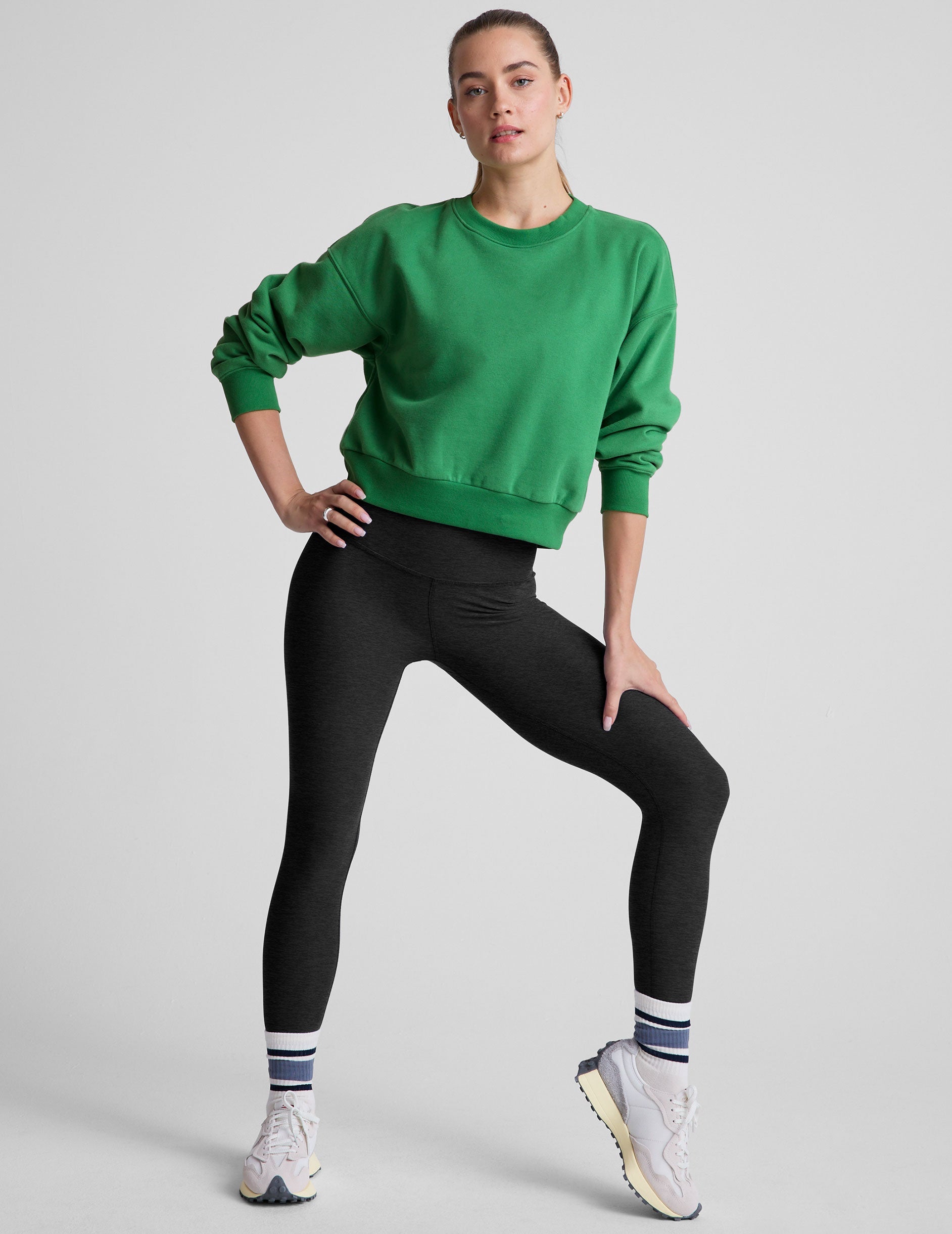 green crew neck sweatshirt.