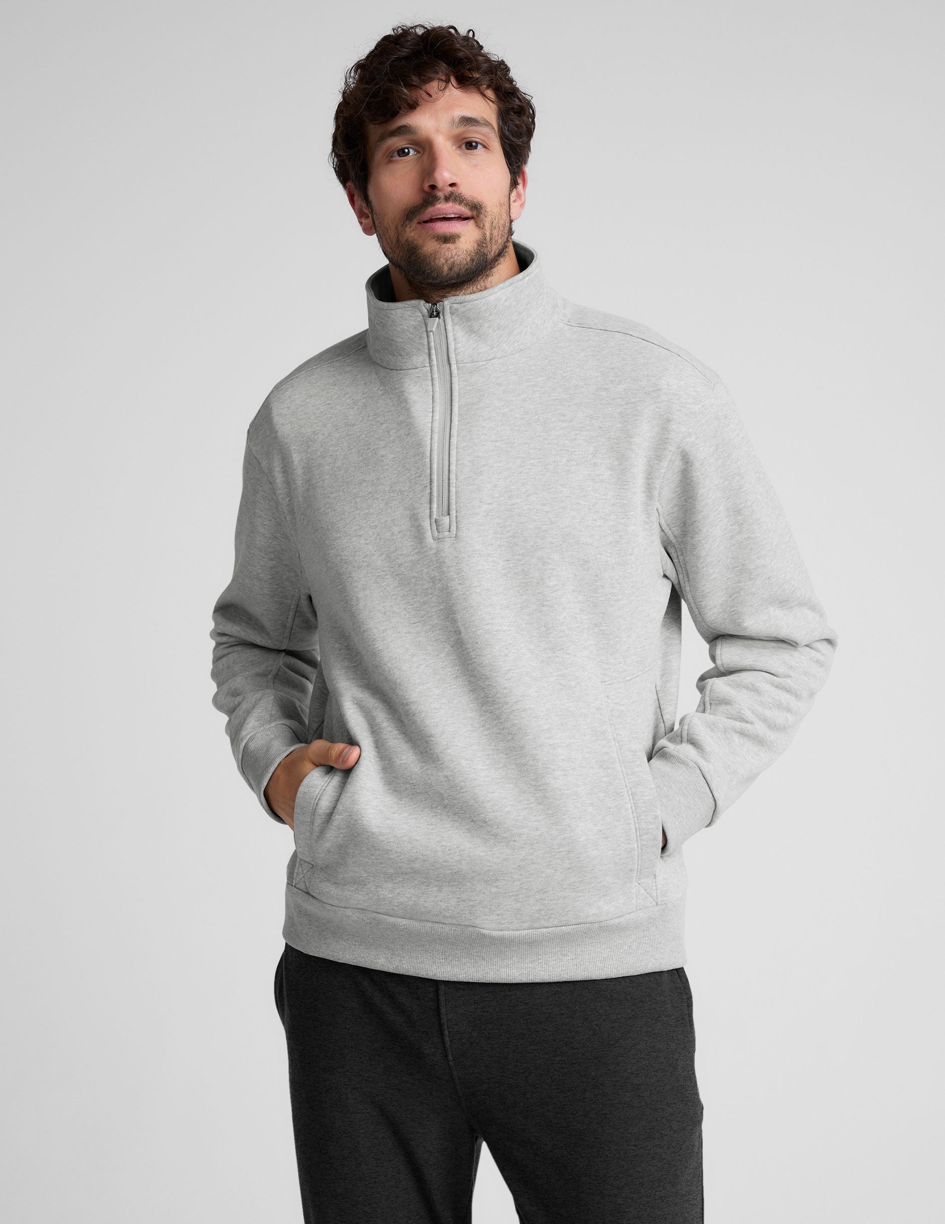 gray quarter zip jacket with kangaroo pocket.