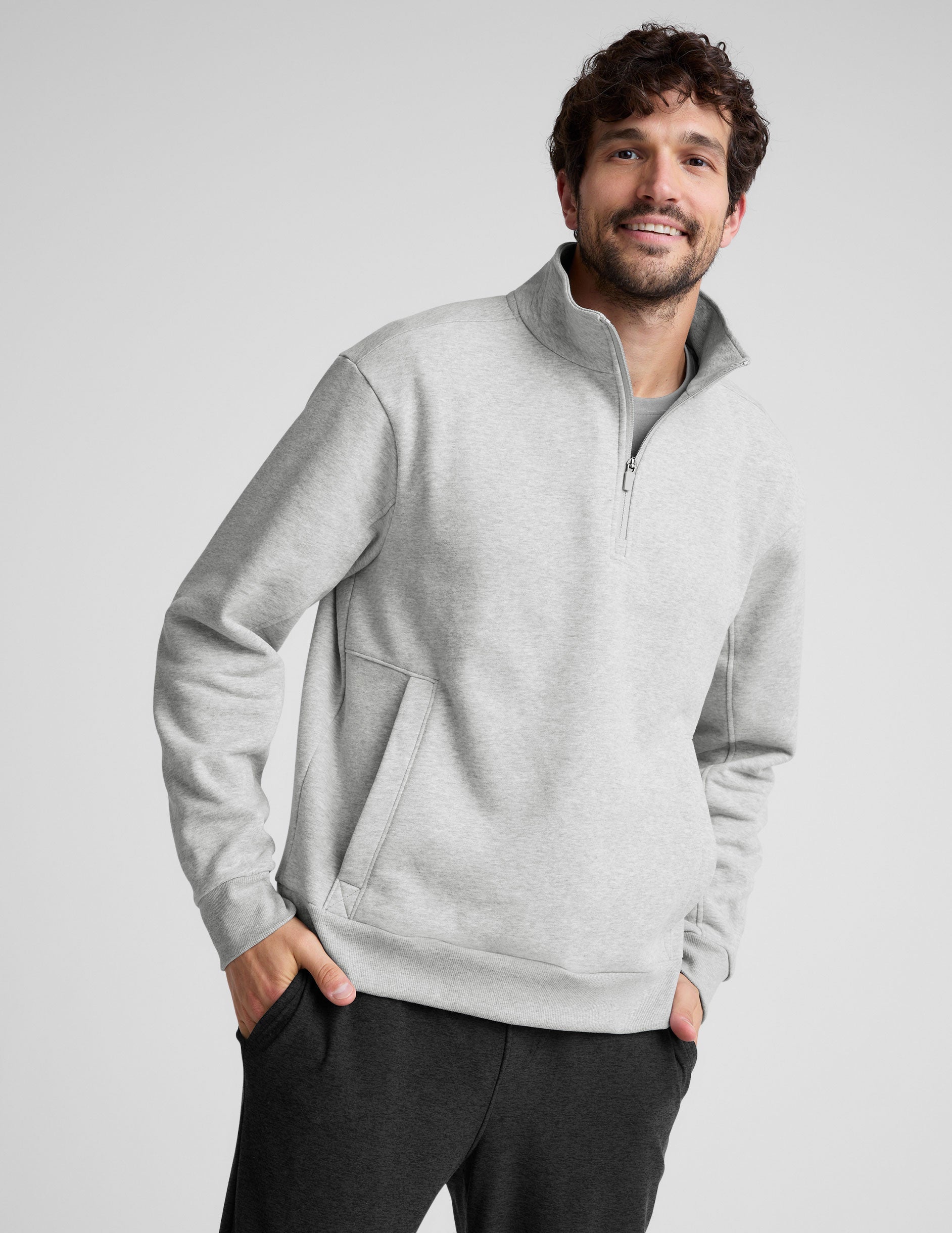 gray quarter zip jacket with kangaroo pocket.