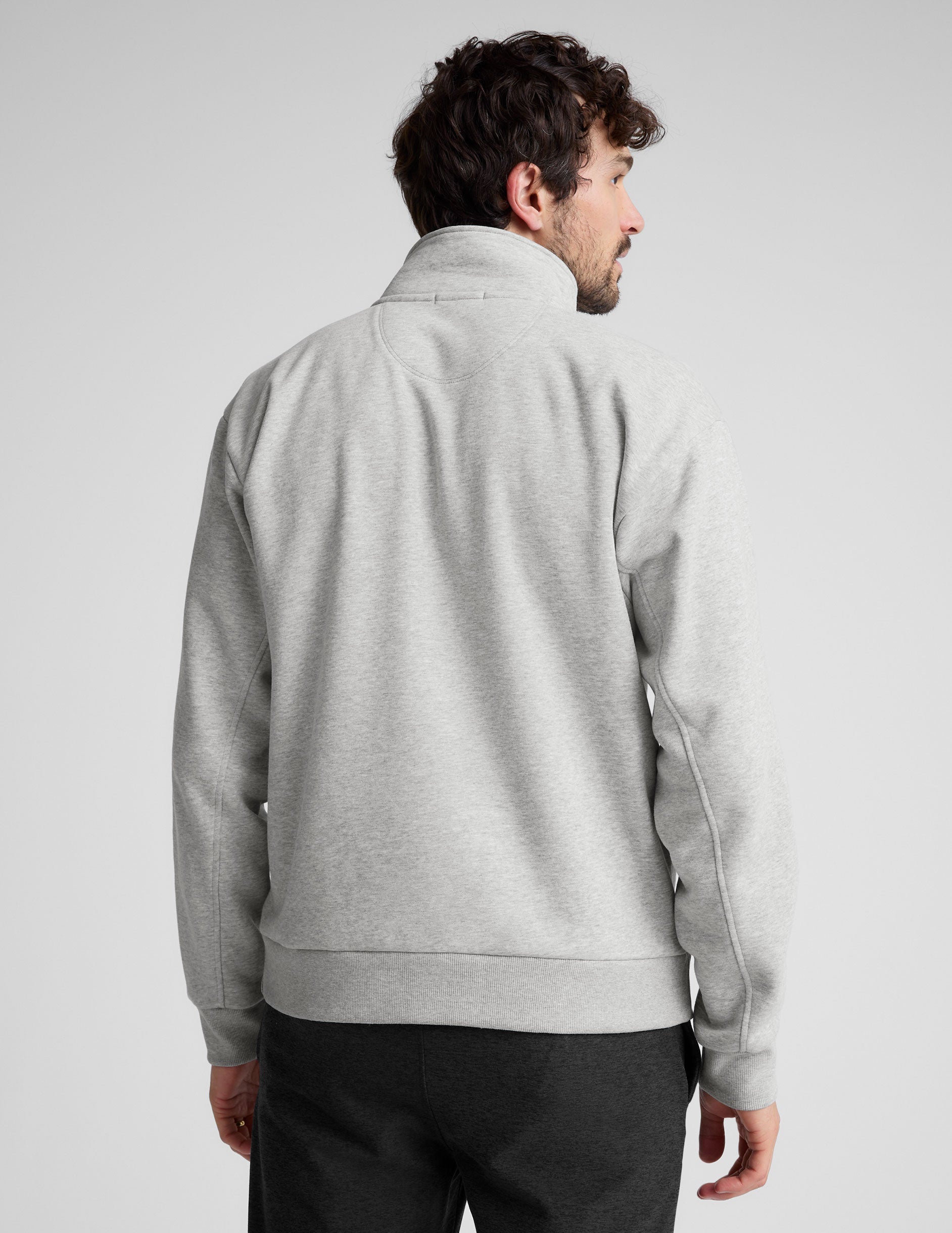 gray quarter zip jacket with kangaroo pocket.