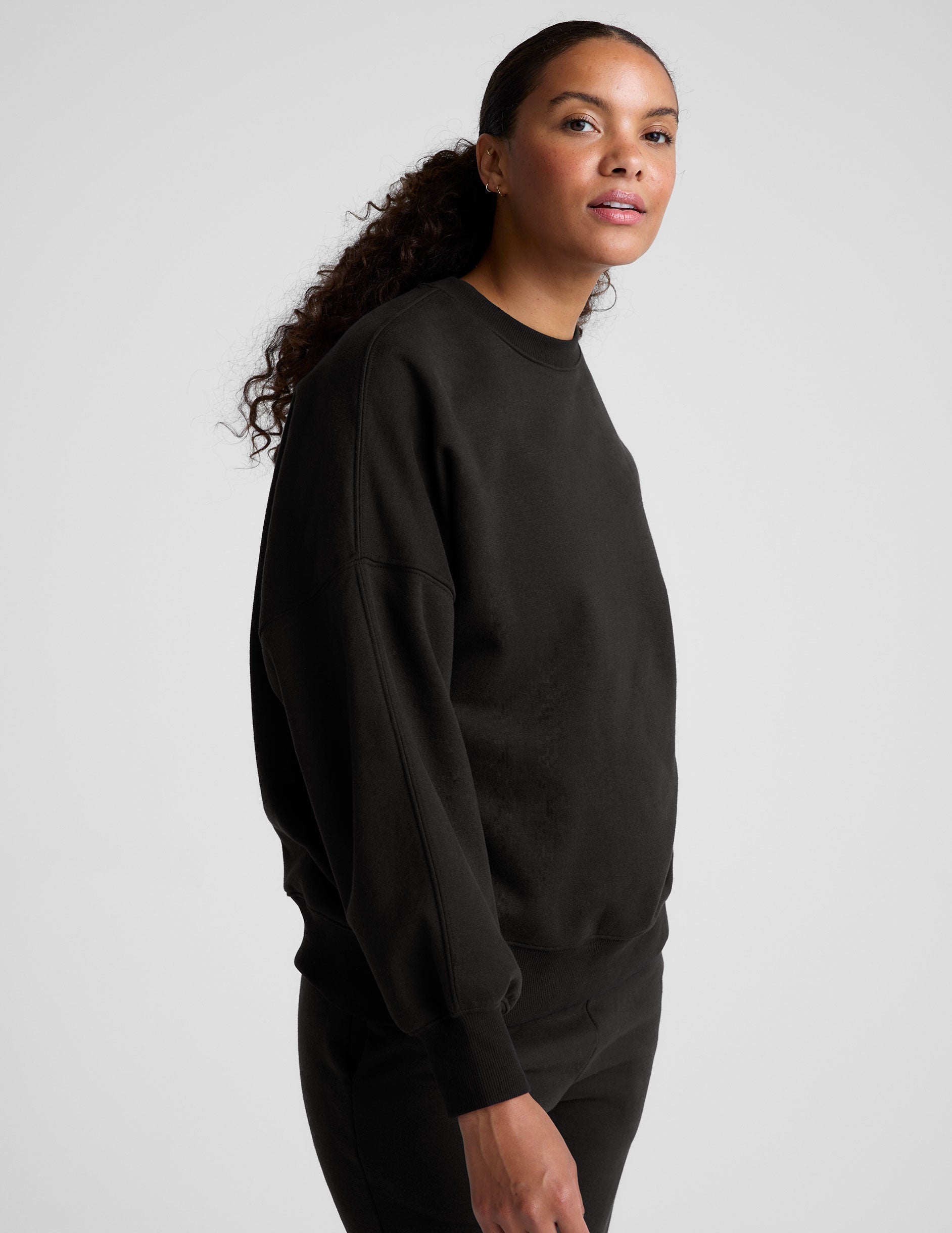 black crew neck sweatshirt.