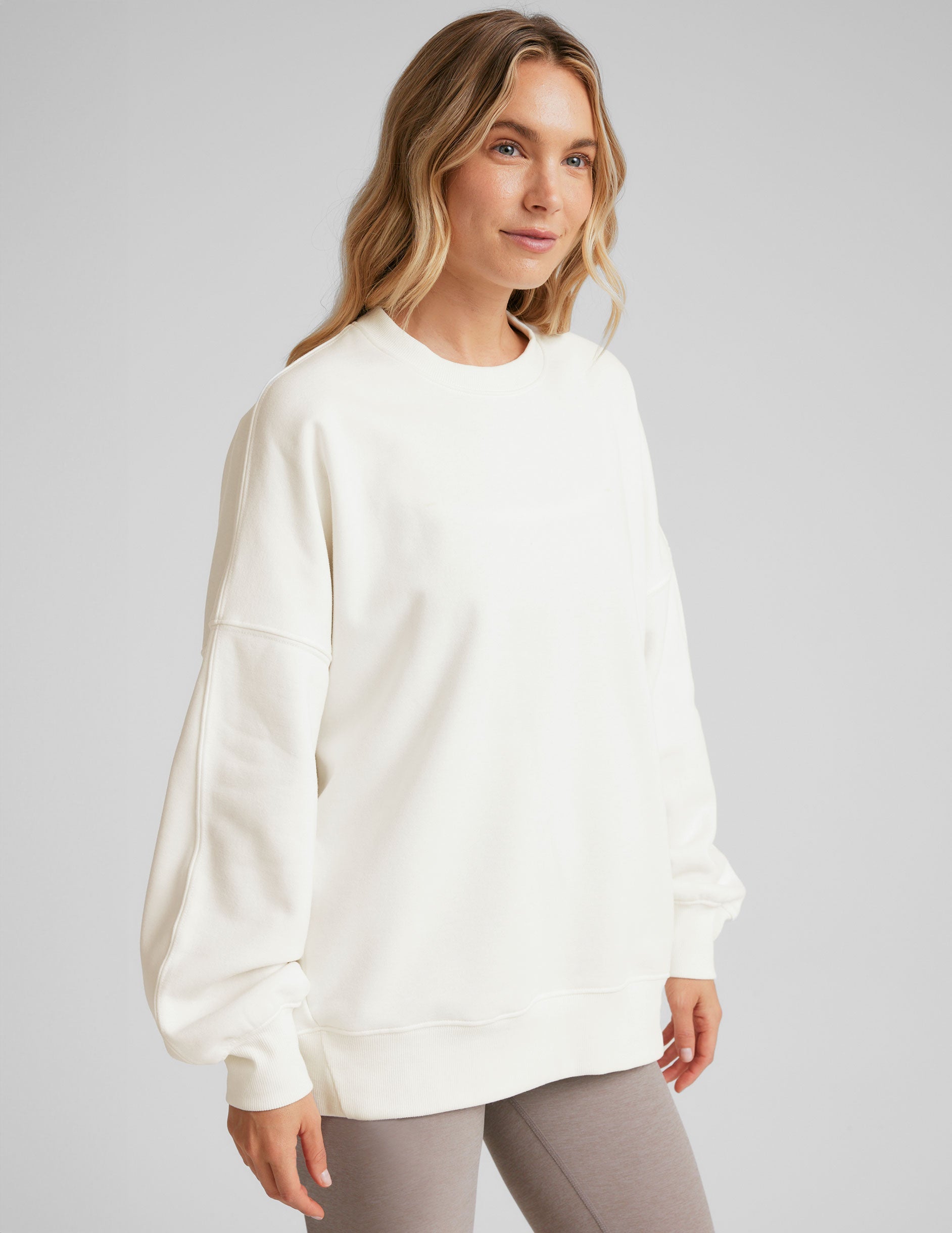 white crew neck sweatshirt.