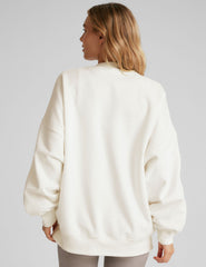 white crew neck sweatshirt.