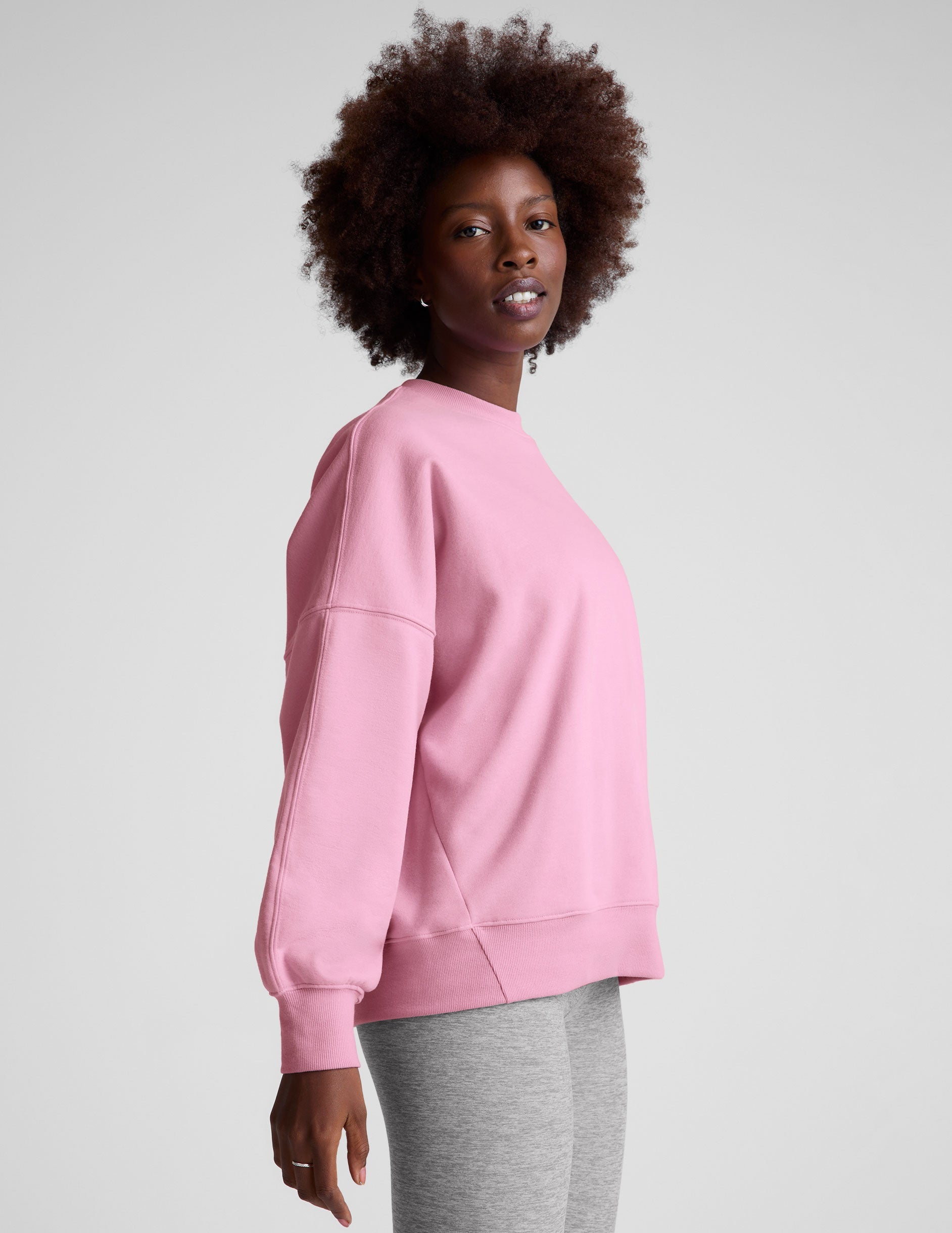 pink oversized fleece crew neck sweatshirt.