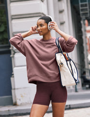 pink oversized crewneck sweatshirt.