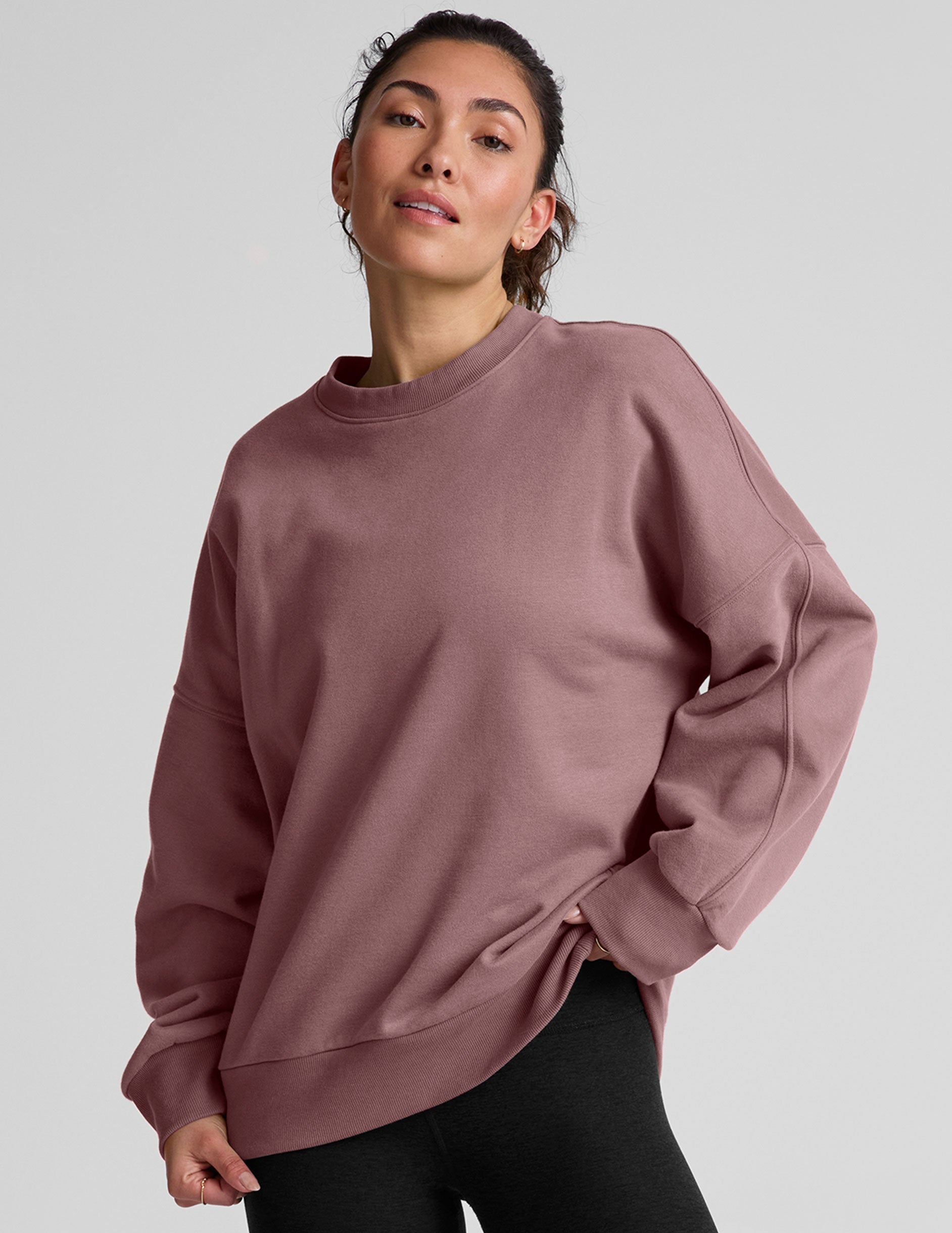 pink oversized crewneck sweatshirt.