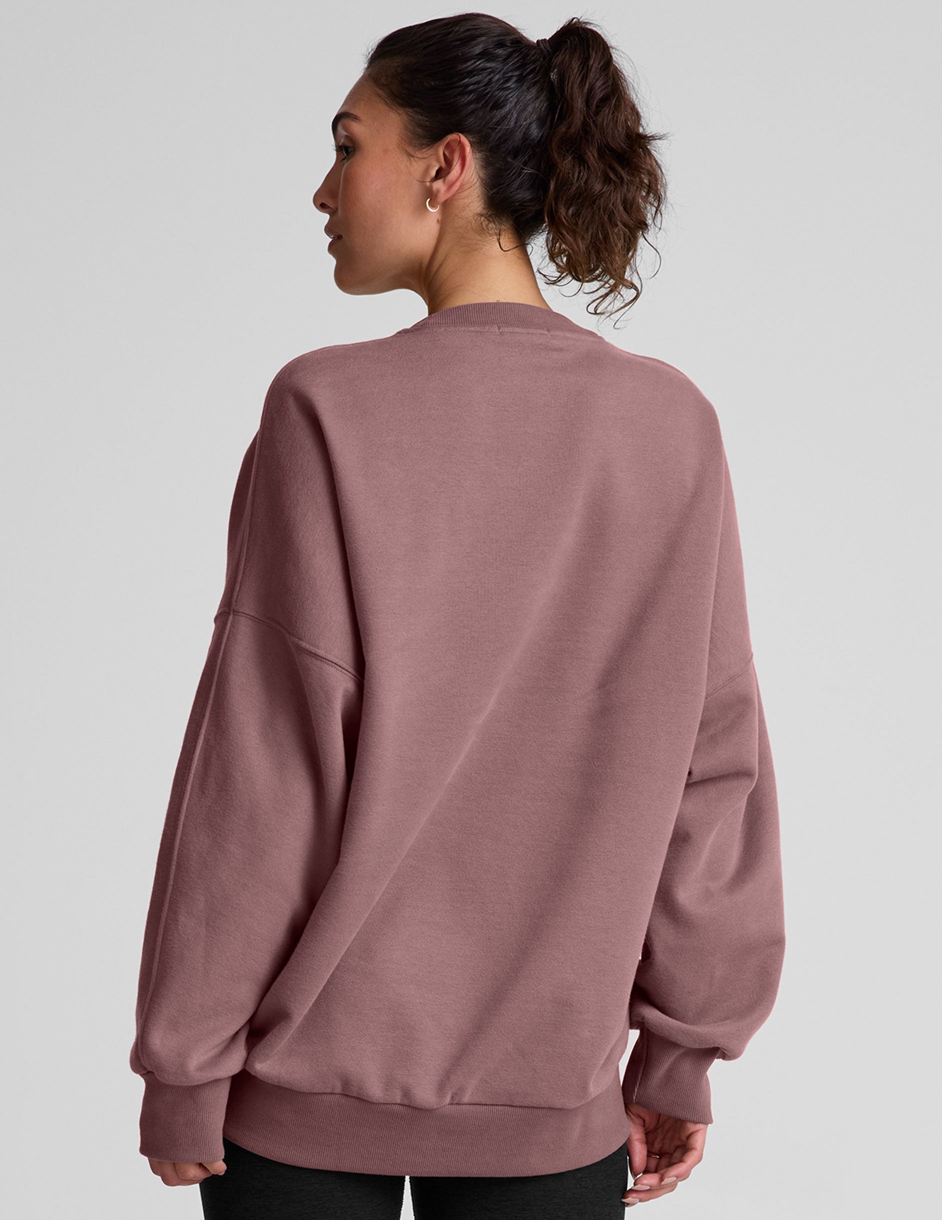 pink oversized crewneck sweatshirt.