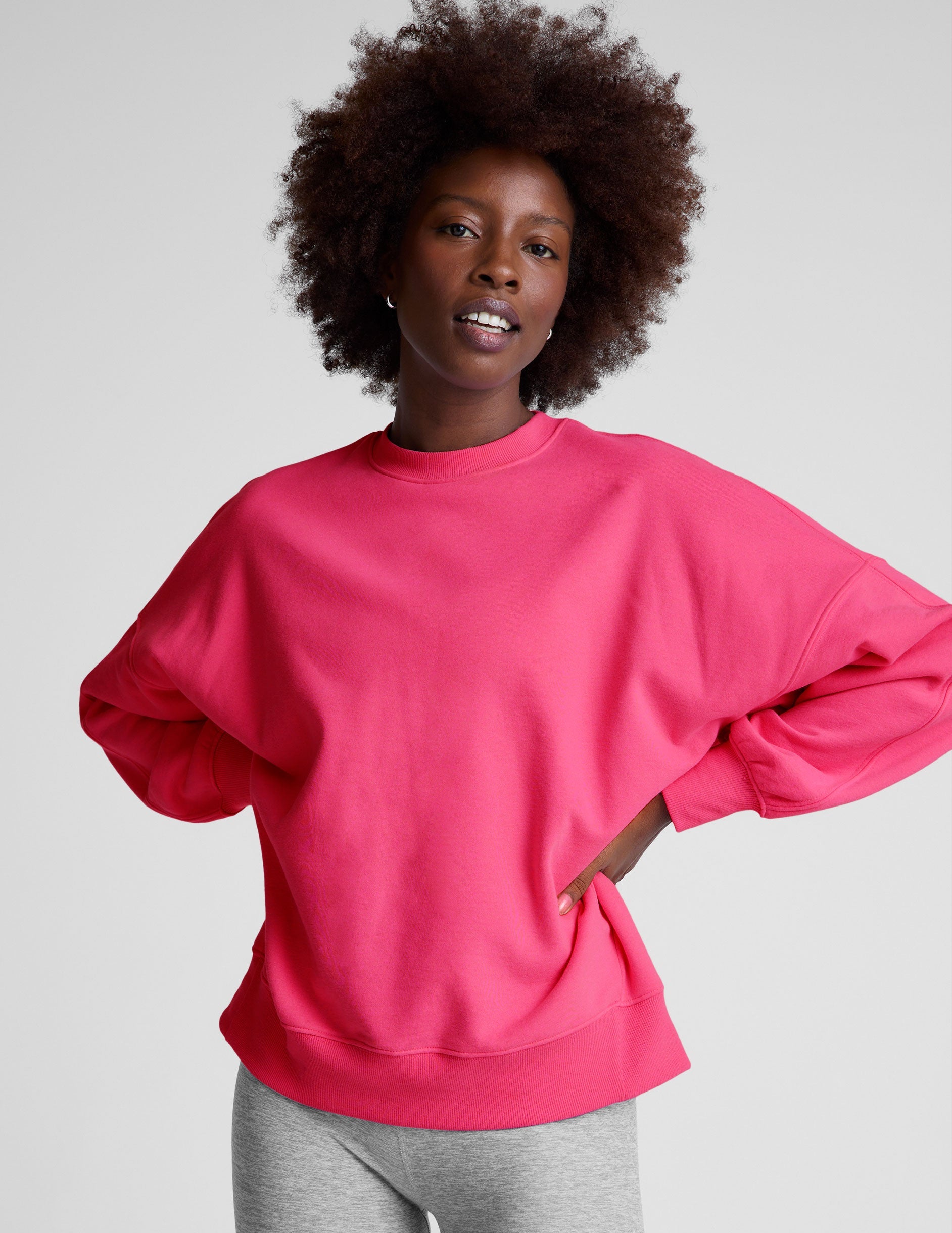 pink oversized crewneck sweatshirt.