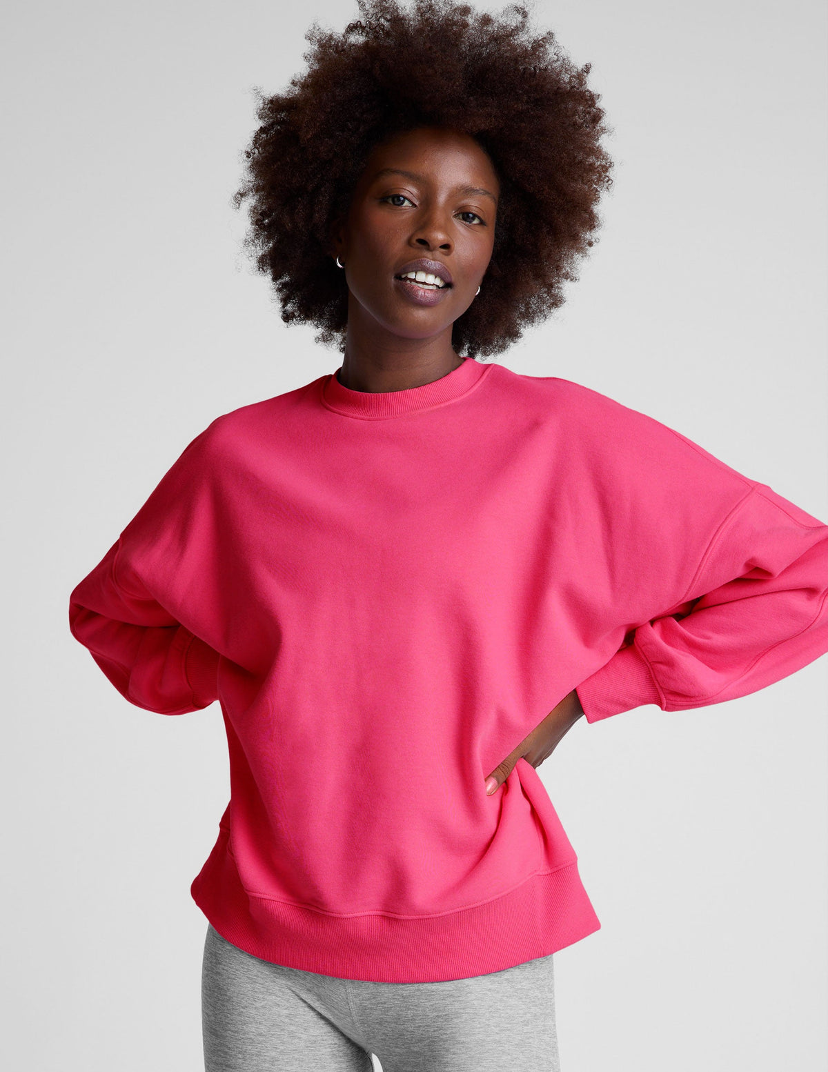 pink oversized crewneck sweatshirt.