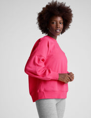 pink oversized crewneck sweatshirt.