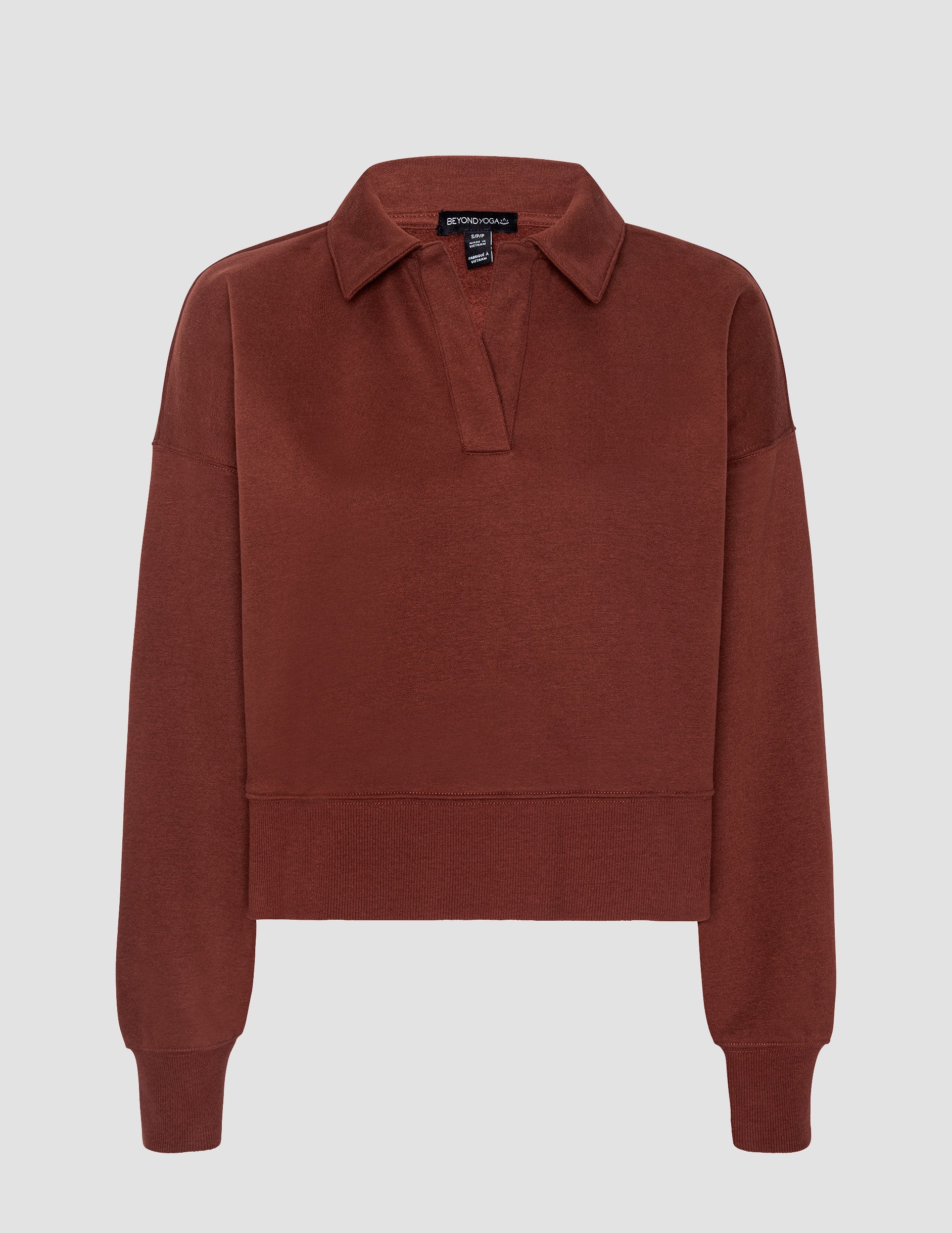 brown v-neck collared sweater.
