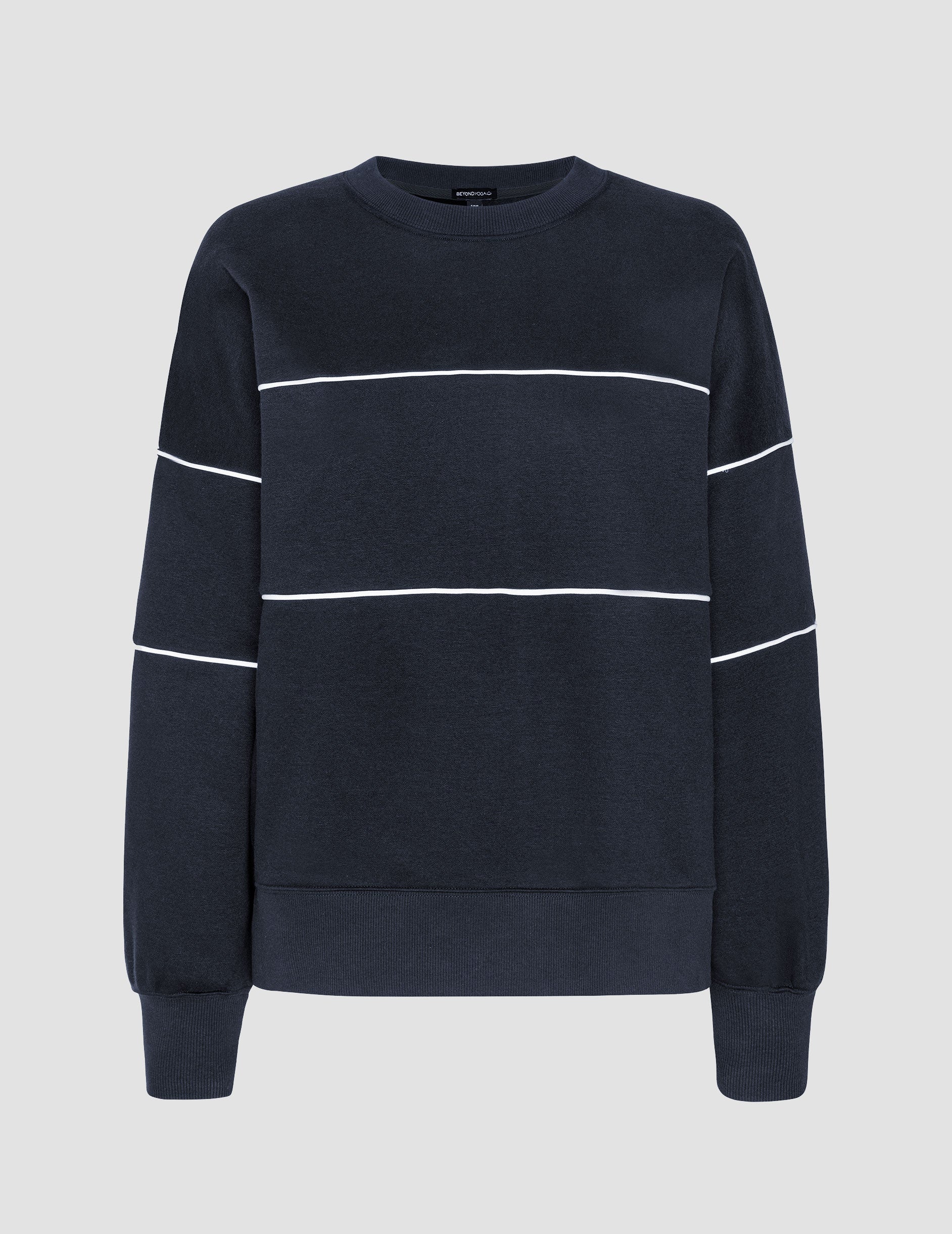 blue fleece crewneck sweater with white contrast piping trim at chest and sleeves.