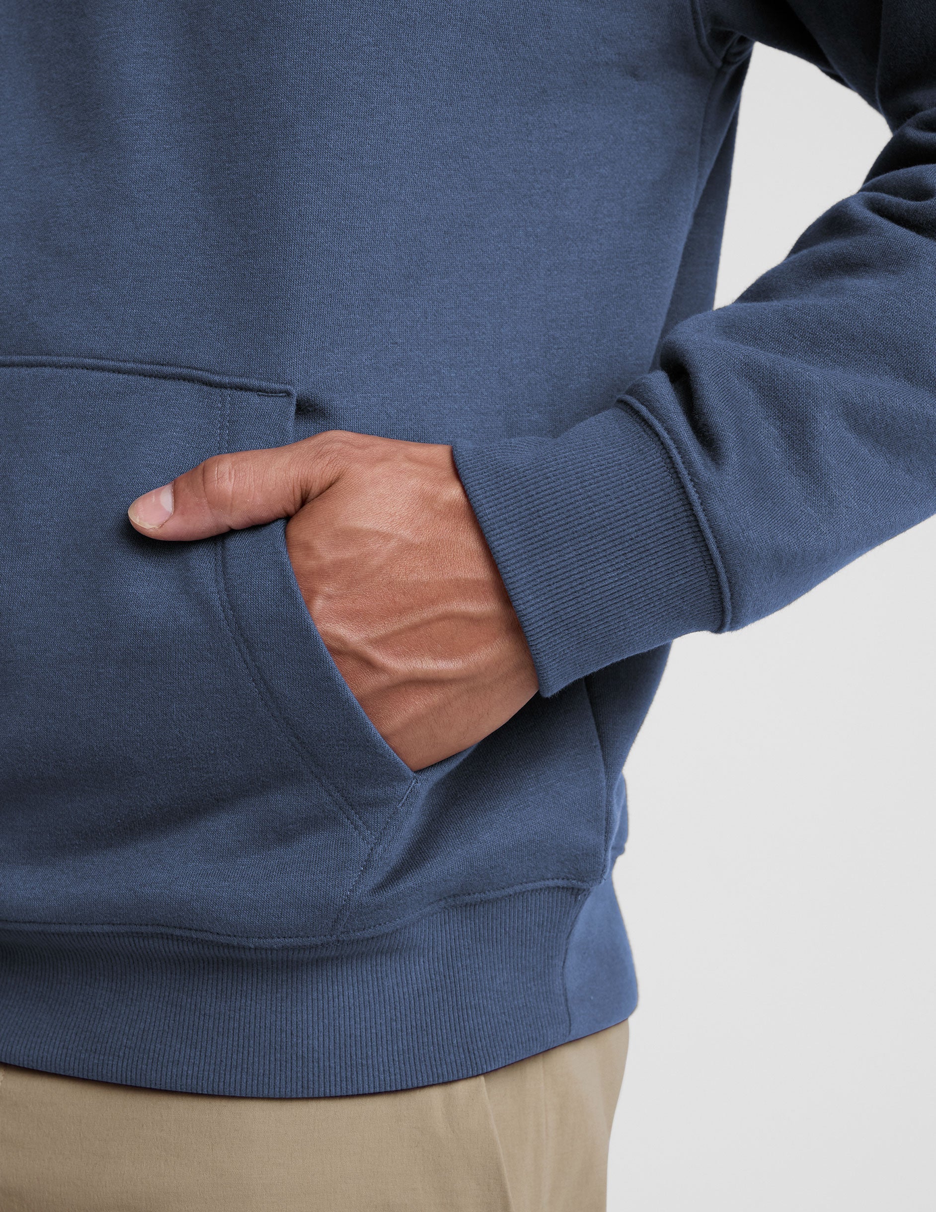 blue men's fleece hoodie with a kangaroo front pocket.