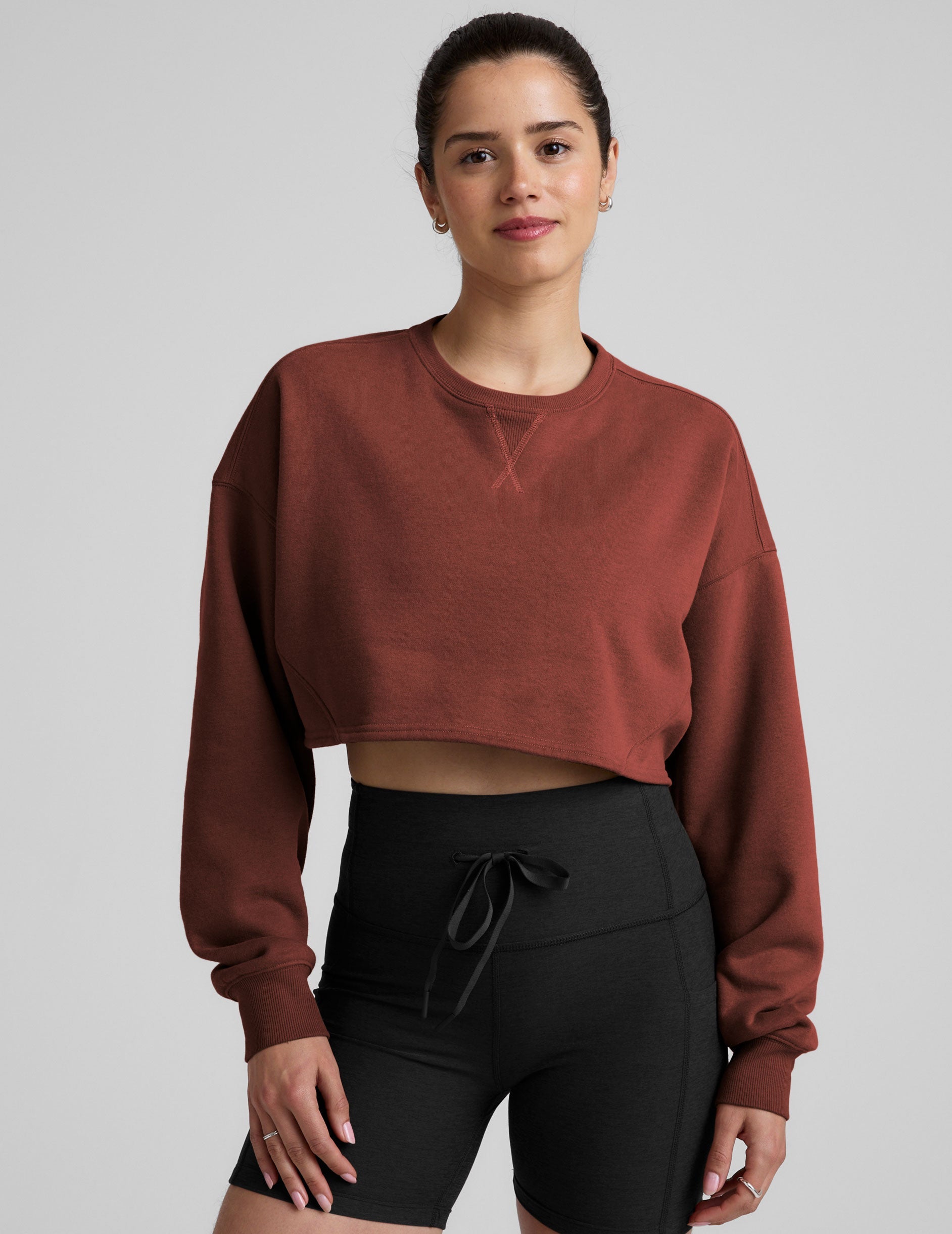 brown cropped crew neck loose fitting sweatshirt.
