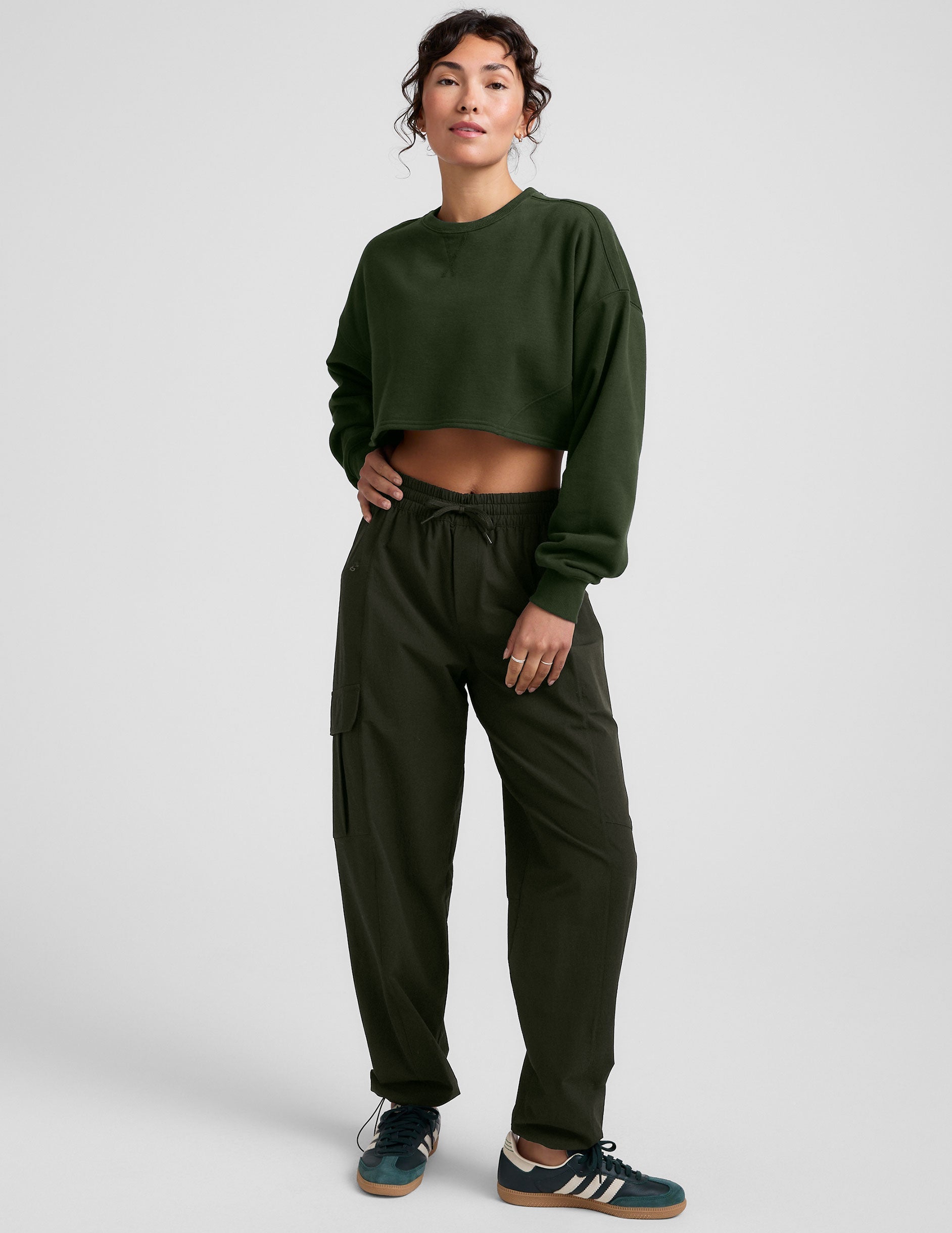 green cropped crew neck loose fitting sweatshirt.