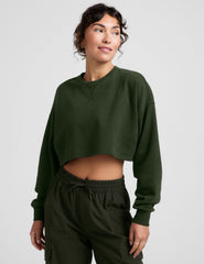 green cropped crew neck loose fitting sweatshirt.