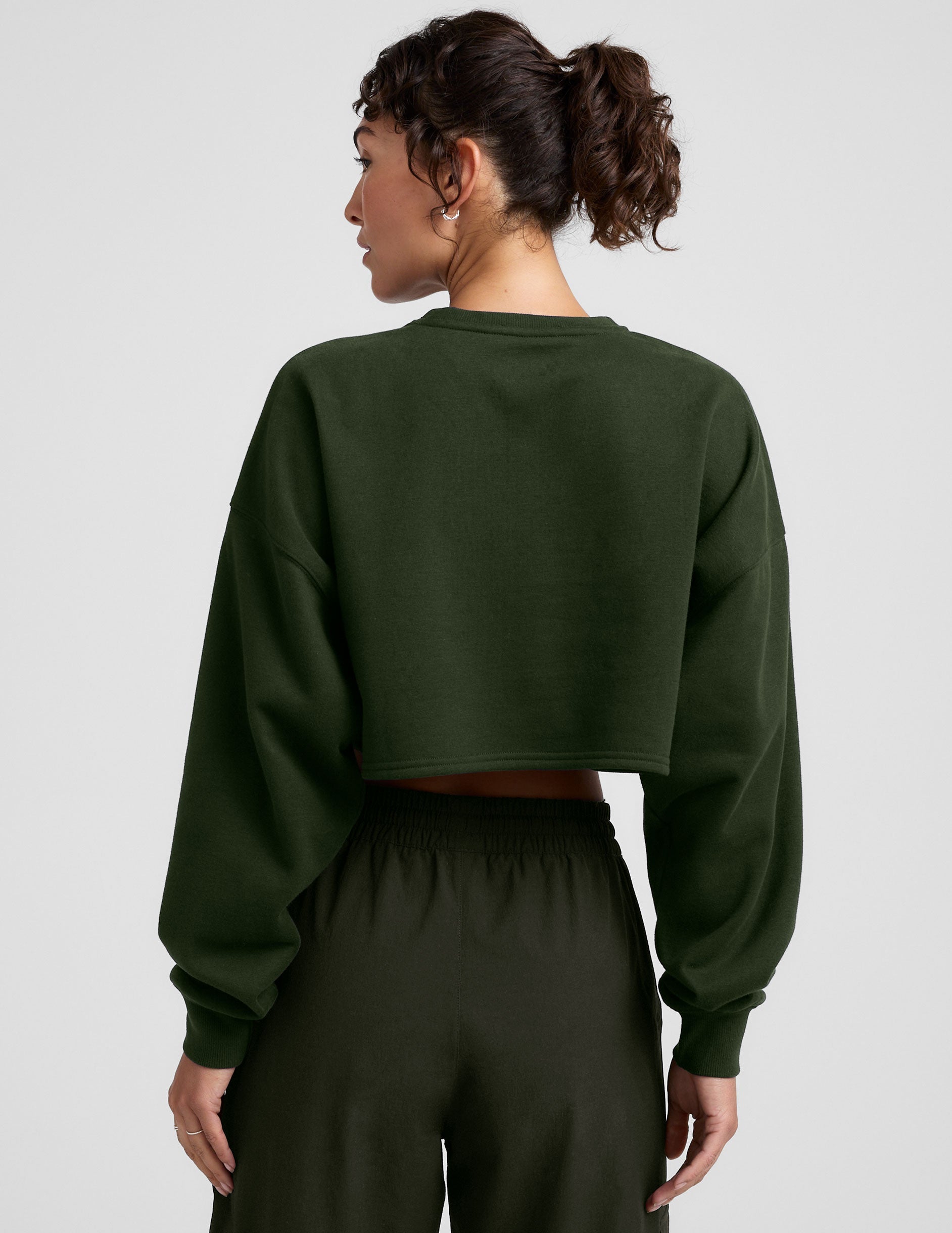 green cropped crew neck loose fitting sweatshirt.