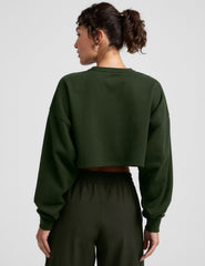 green cropped crew neck loose fitting sweatshirt.