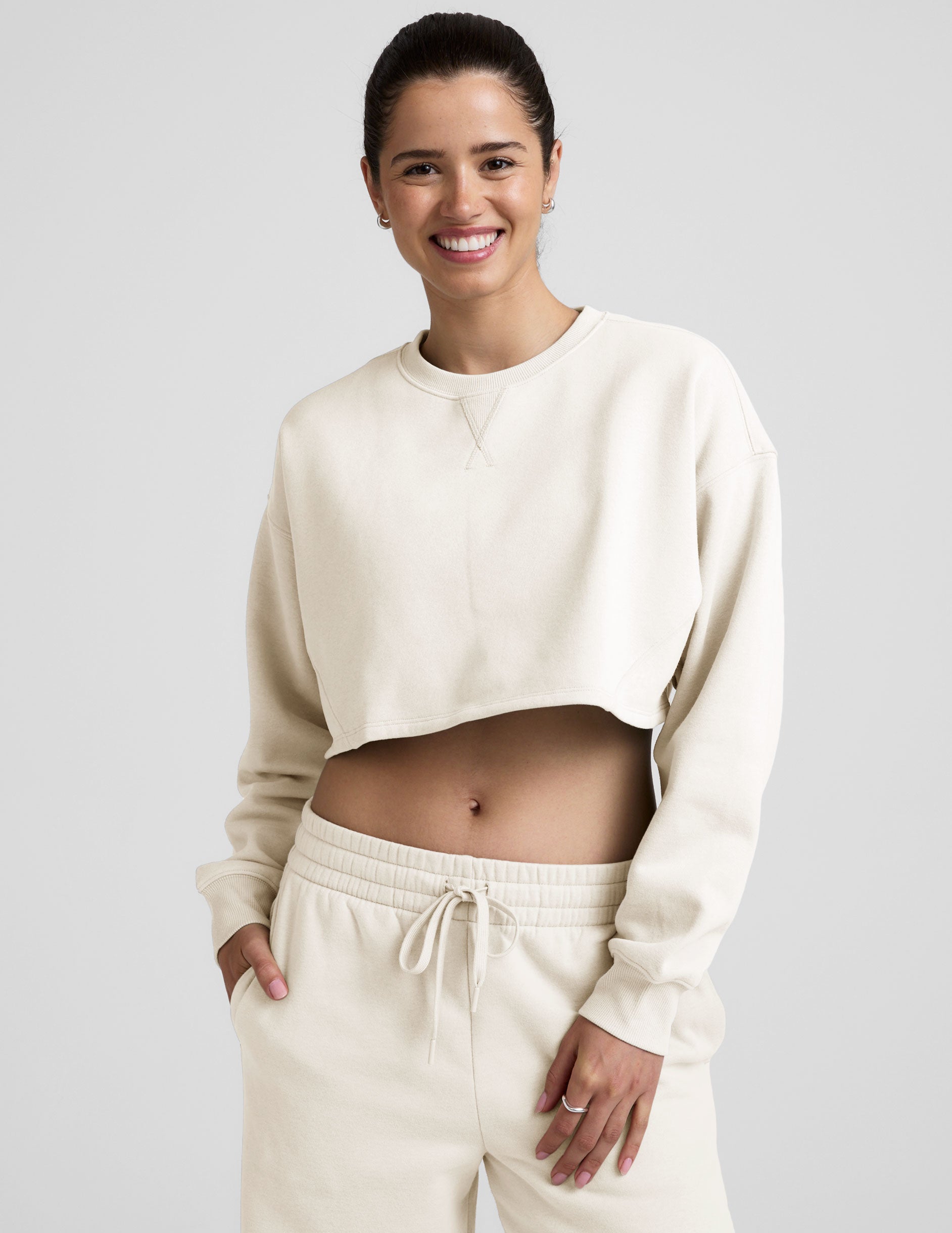 white cropped crew neck loose fitting sweatshirt.
