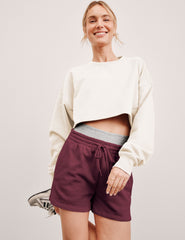 white cropped crew neck loose fitting sweatshirt.