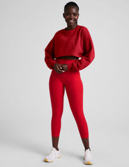 red cropped crew neck loose fitting sweatshirt.