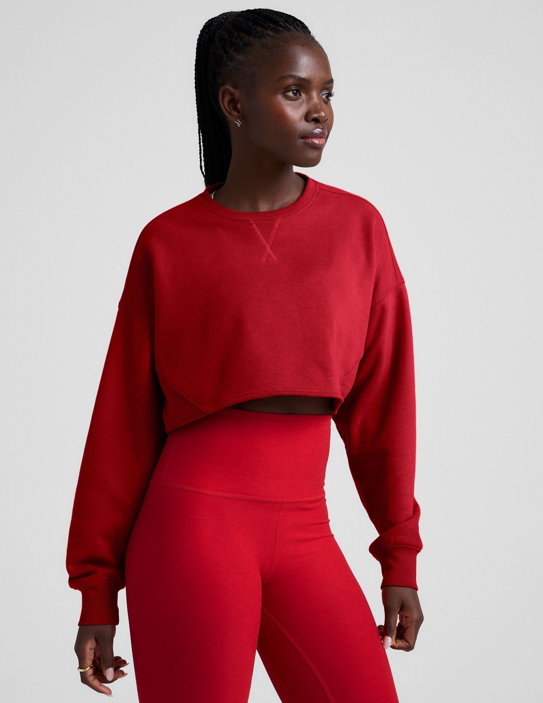 red cropped crew neck loose fitting sweatshirt.