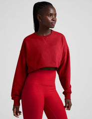 red cropped crew neck loose fitting sweatshirt.