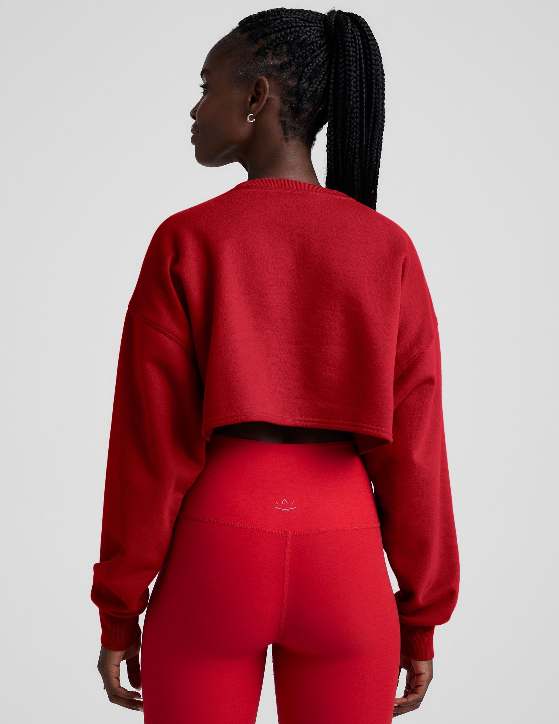 red cropped crew neck loose fitting sweatshirt.