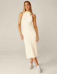 white ribbed mock neck tank top midi dress with a front side slit.