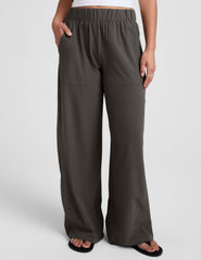 dark gray wide leg pants with pockets.