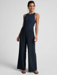 blue mid-rise wide leg pant with pockets.
