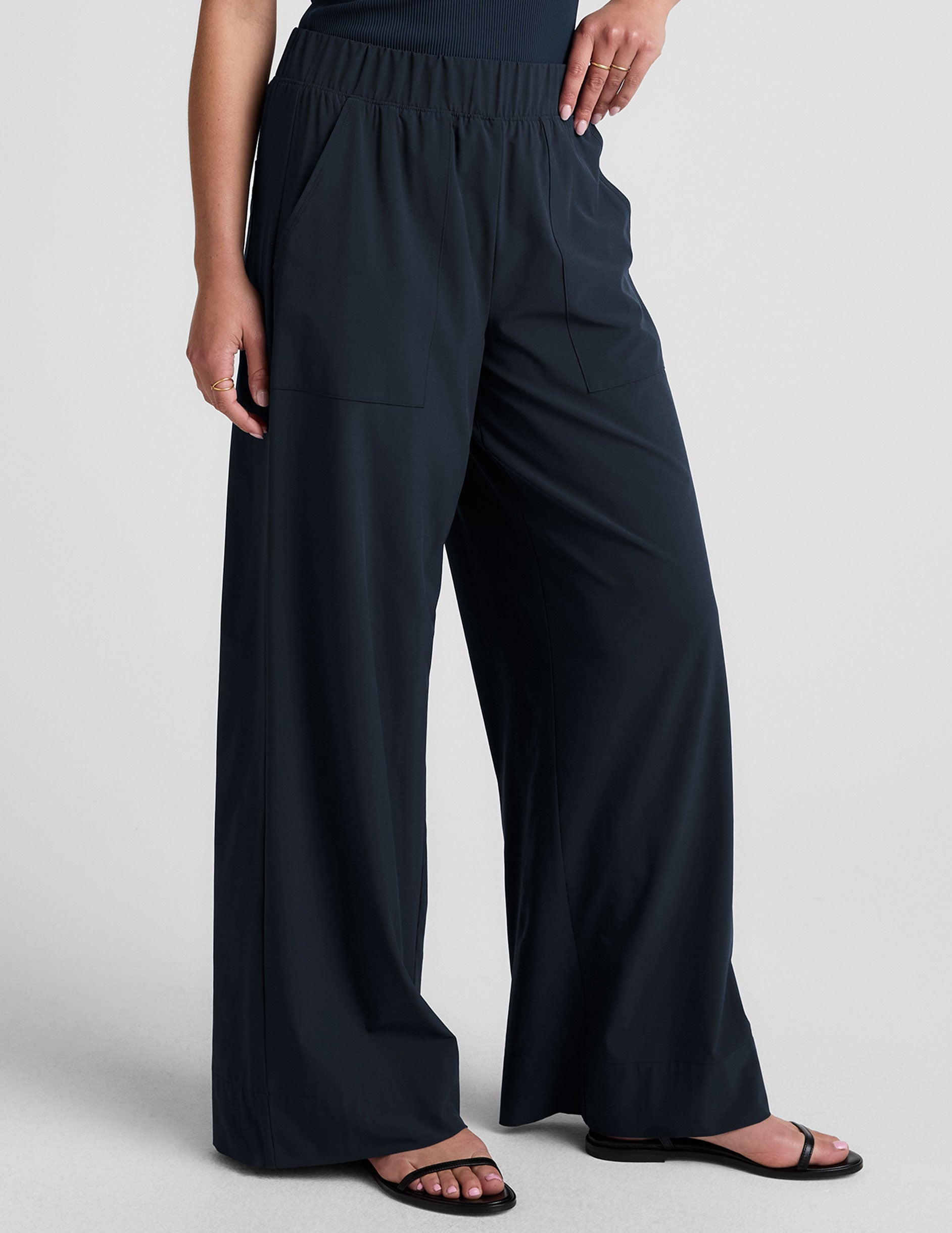 blue mid-rise wide leg pant with pockets.