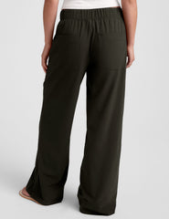 green mid rise pants with front and side pockets.
