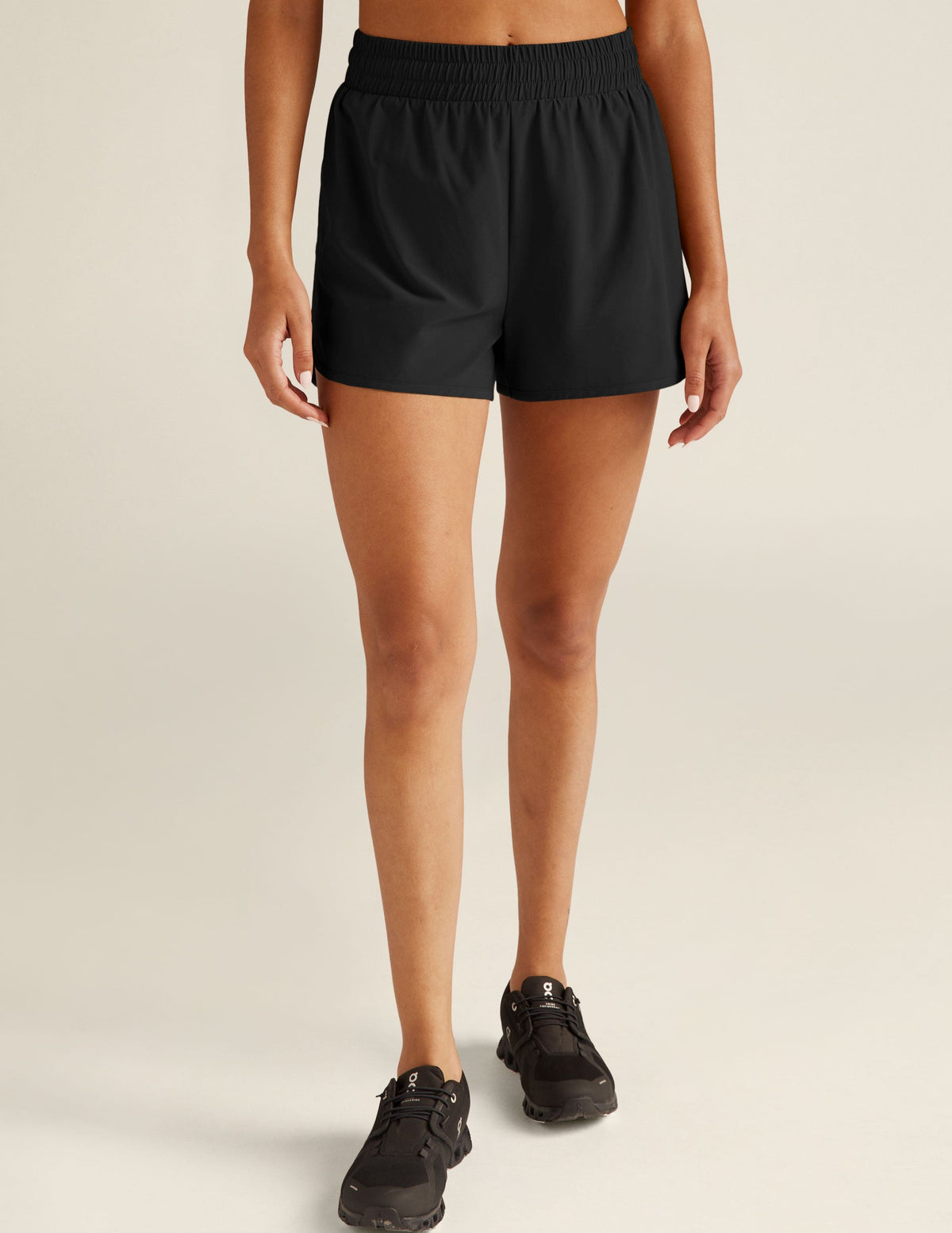 black athletic shorts with built-in shorts underneath.