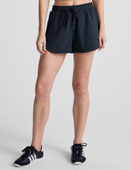 blue 2.5" inseam shorts with pockets and a drawcord at waistband. 