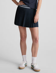 blue mini length pleated skirt with an exposed stripped elastic waistband​ and 
internal performance shorts with pockets​. 