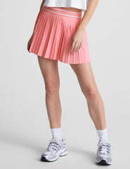 pink pleated mini skirt with an exposed stripped elastic waistband​ and internal performance shorts with pockets​.