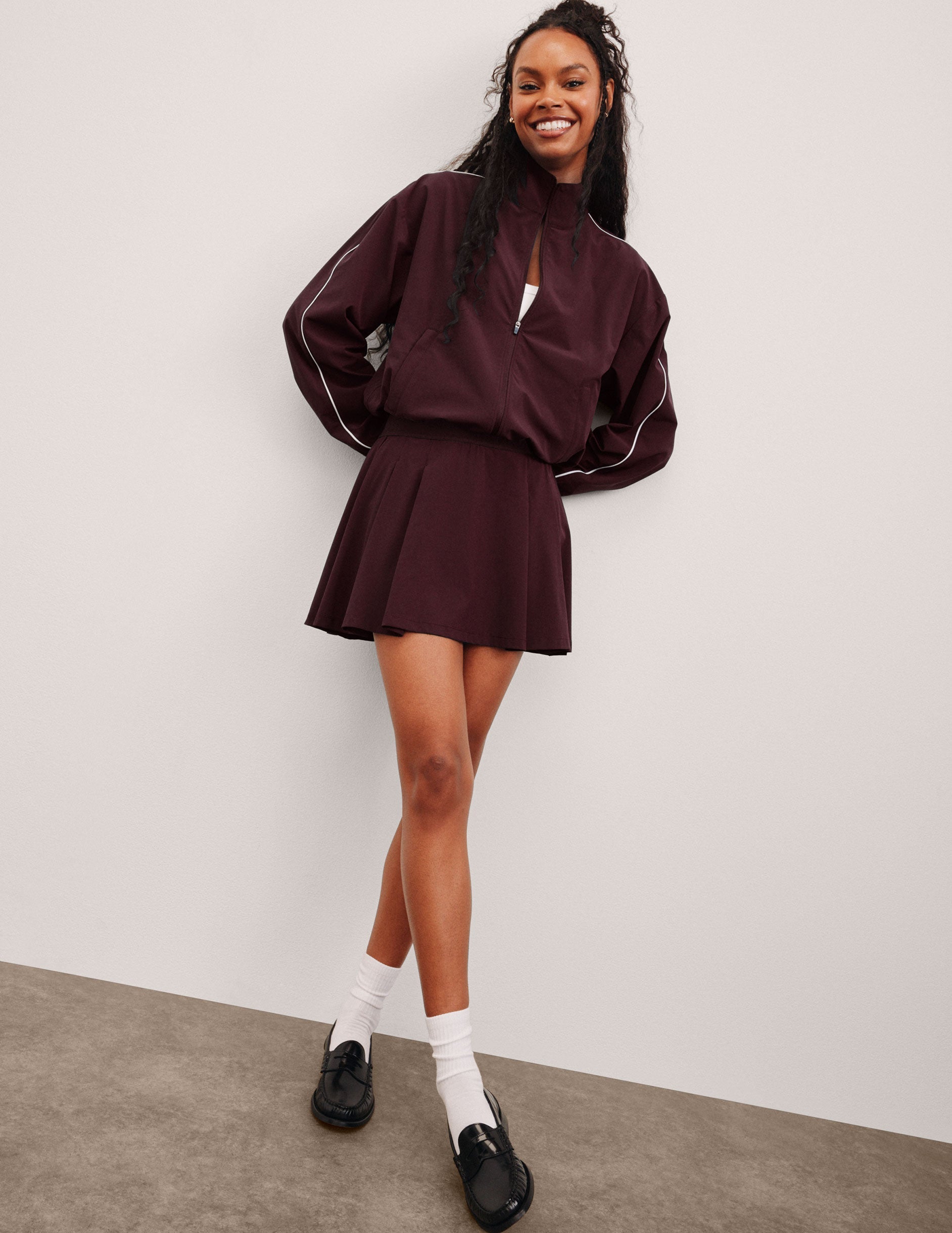 red mini skirt with built-in shorts with pockets.