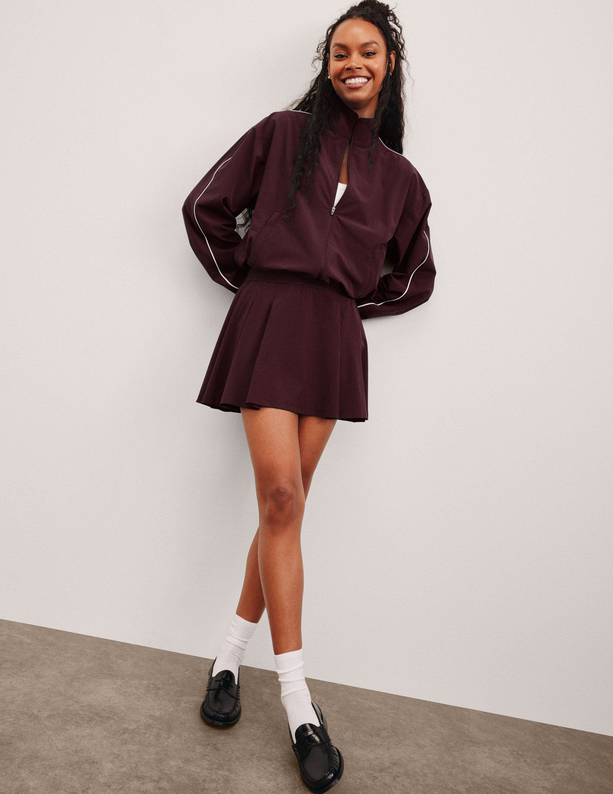 red mini skirt with built-in shorts with pockets.