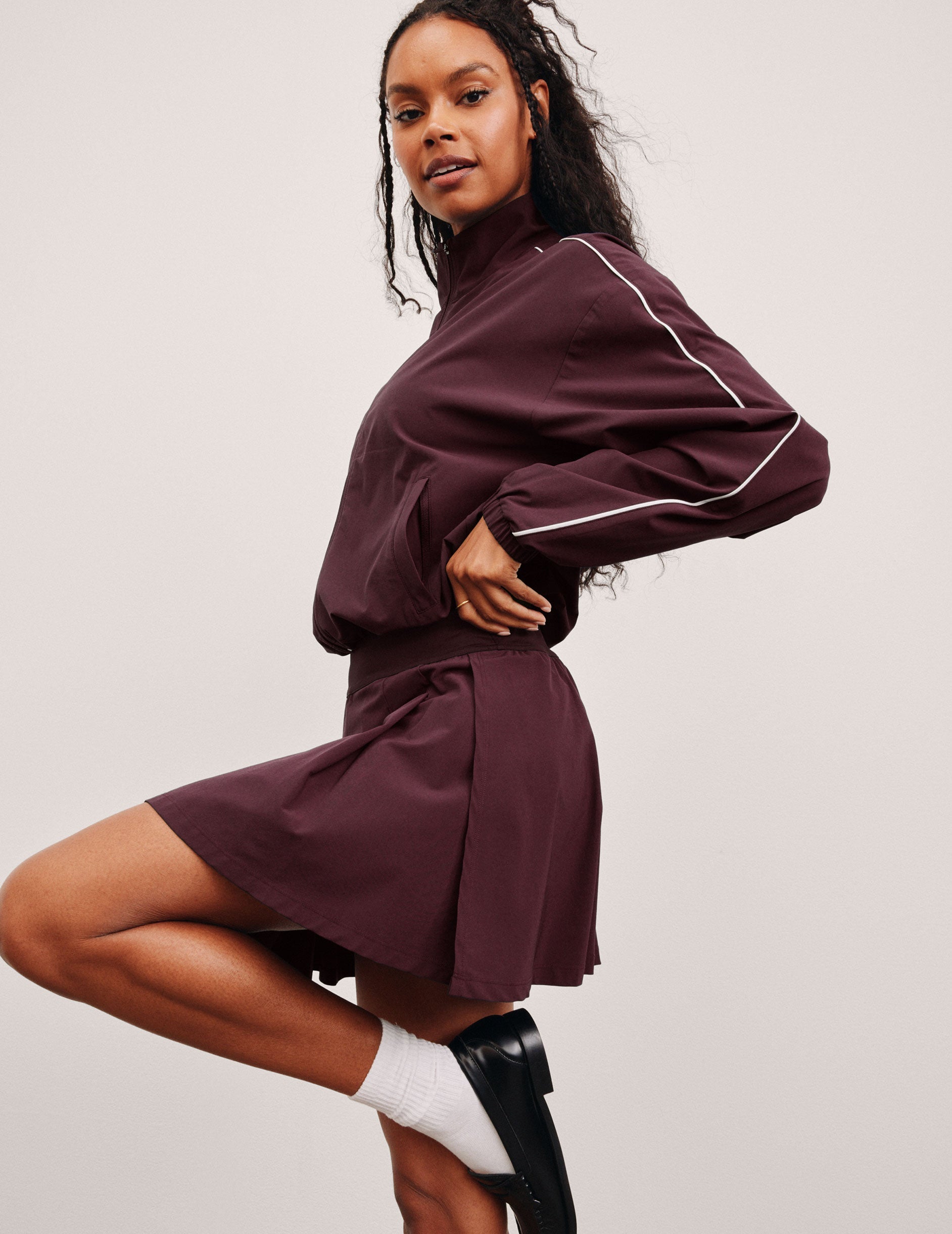 red mini skirt with built-in shorts with pockets.