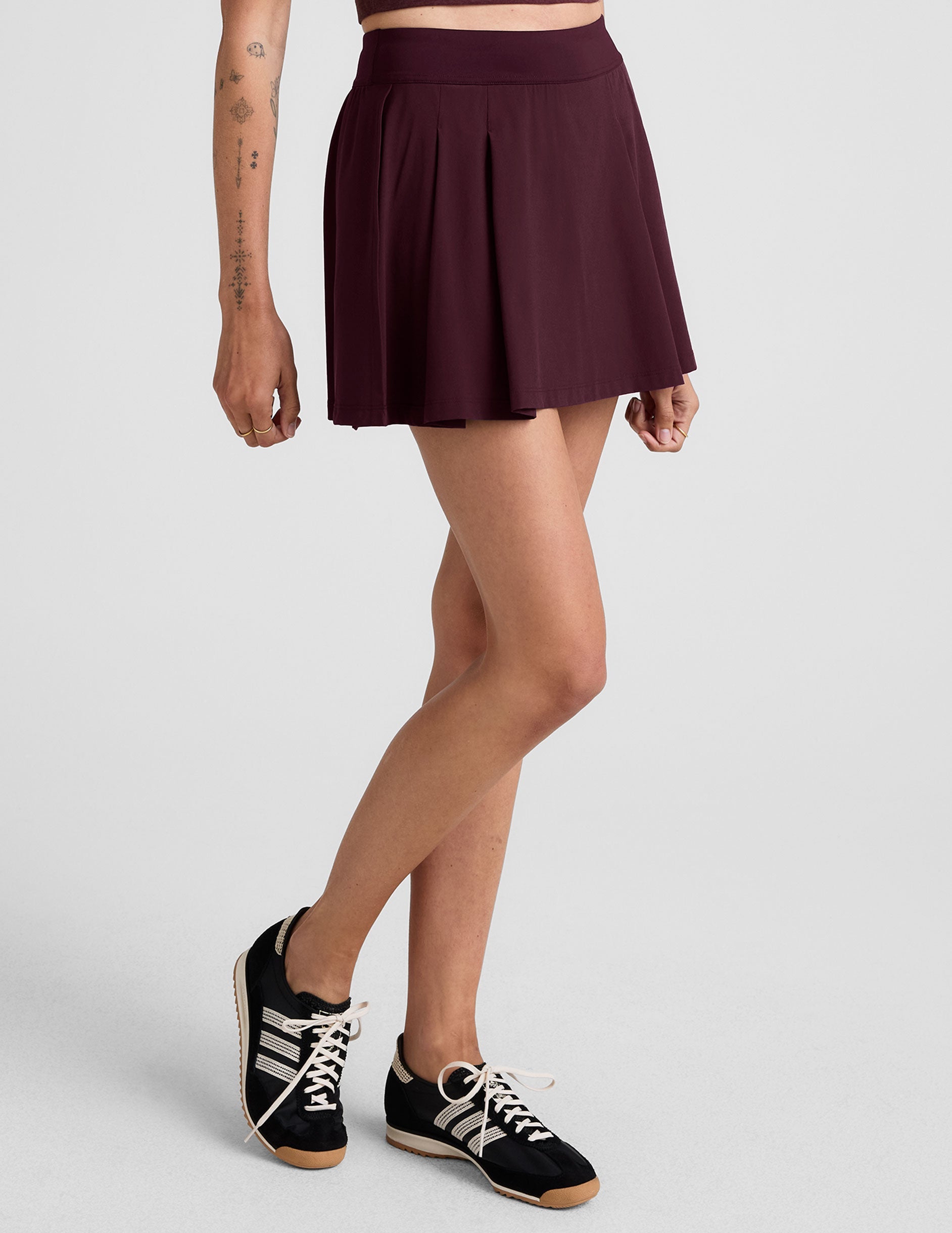 red mini skirt with built-in shorts with pockets.