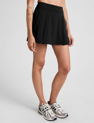 black mini pleated skirt with interior shorts with pockets.
