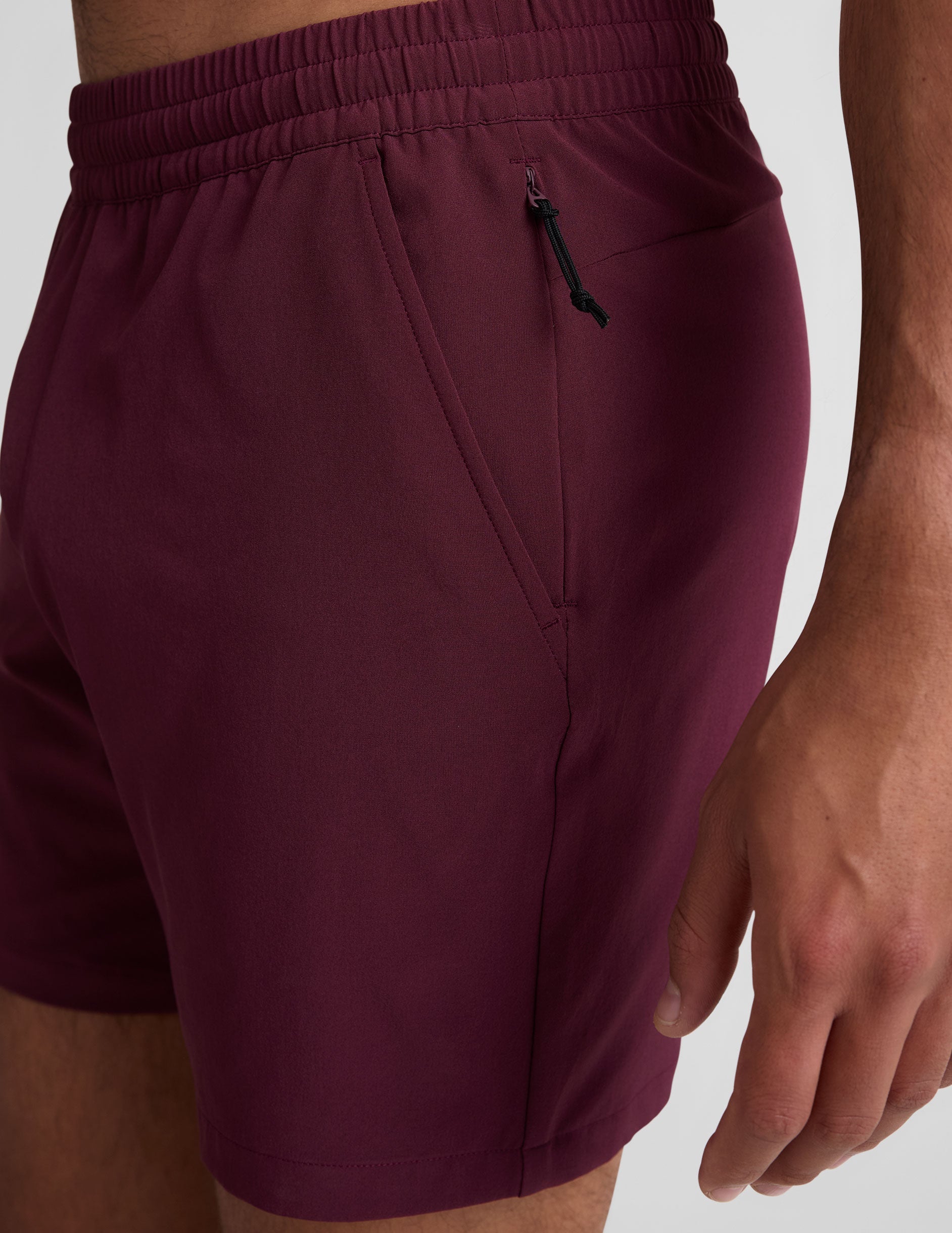 maroon men's shorts with pockets.