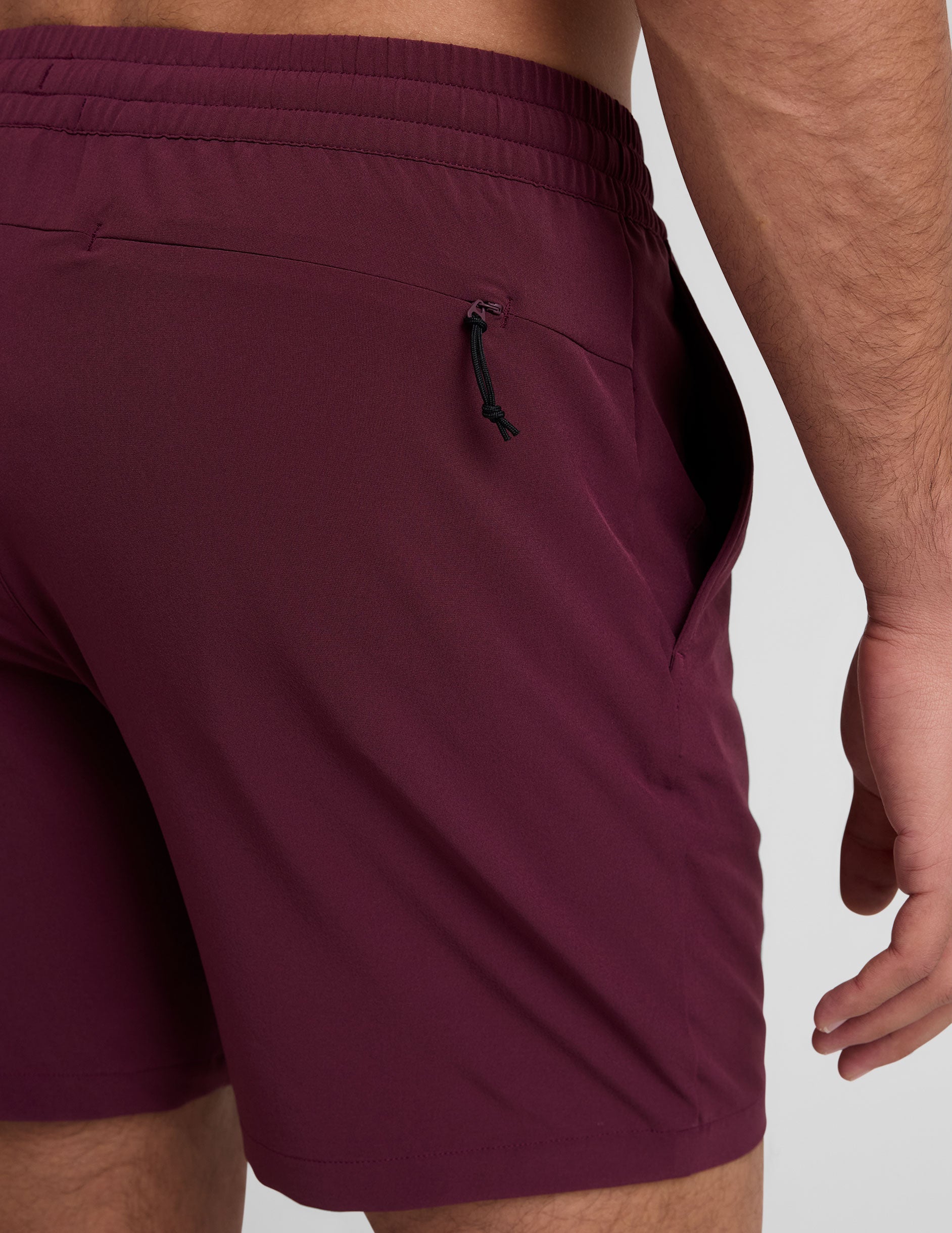maroon men's shorts with pockets.