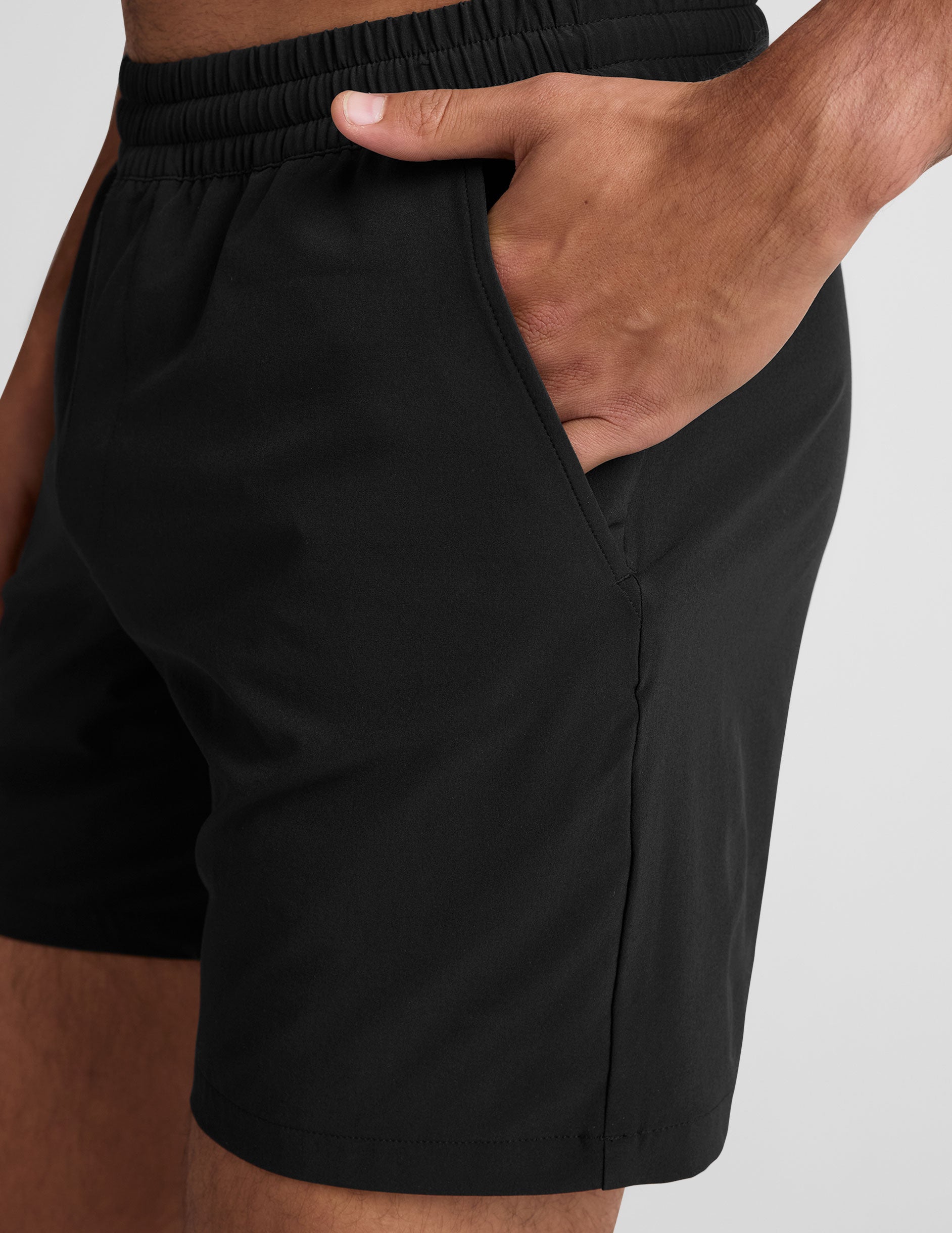black men's 7" inseam lightweight shorts with pockets. 