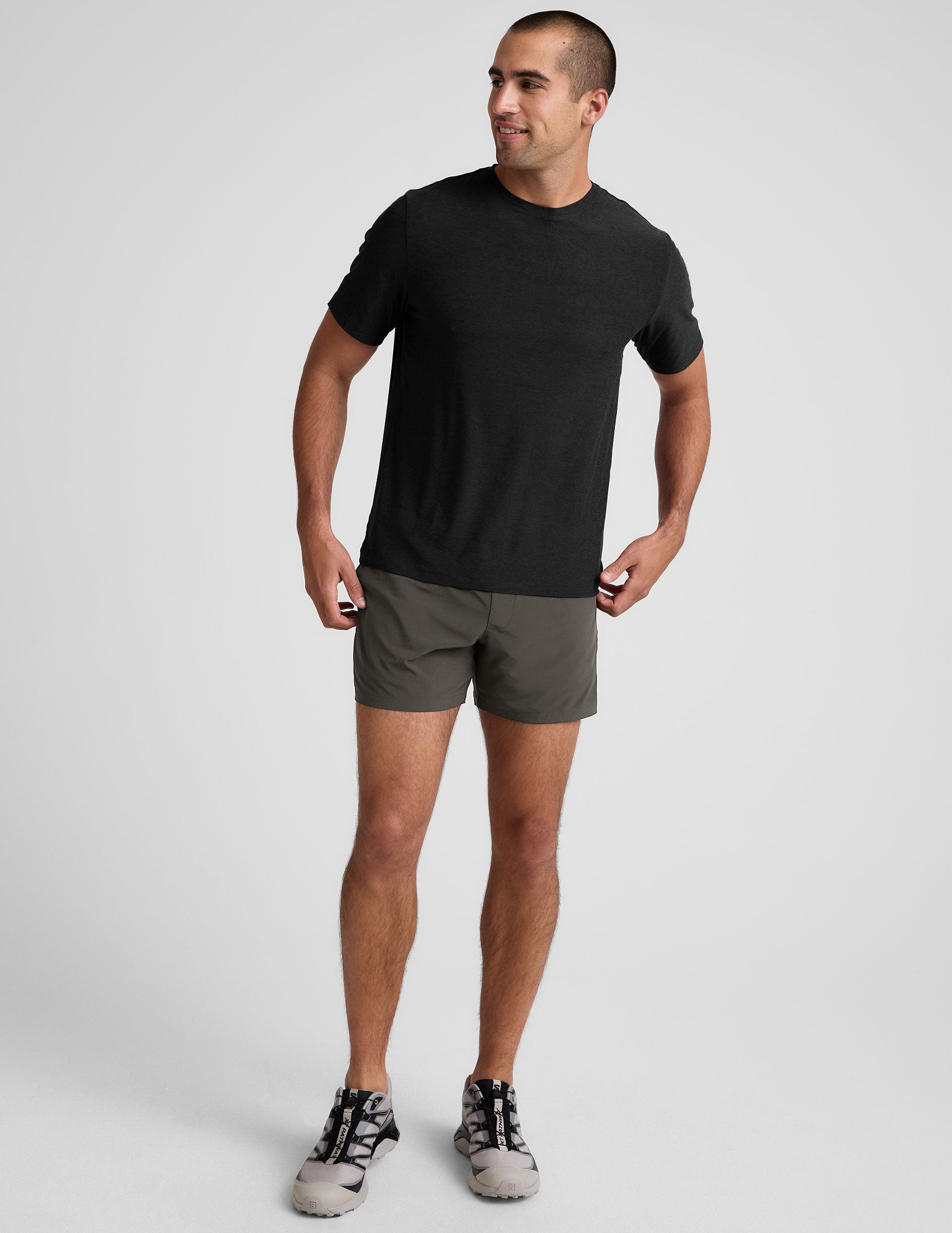 grey men's 5" shorts on a plain background. 