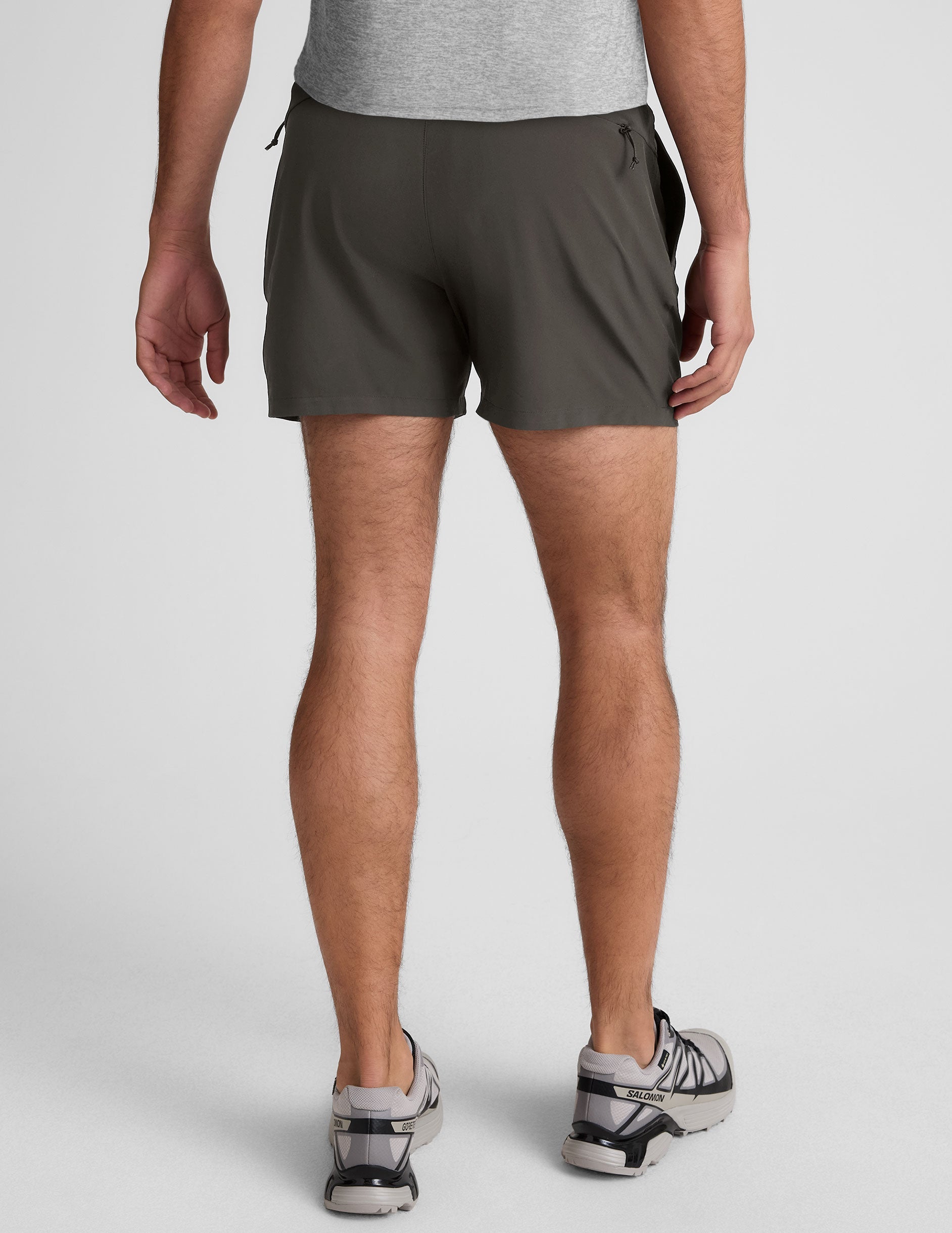 grey men's 5" shorts on a plain background. 