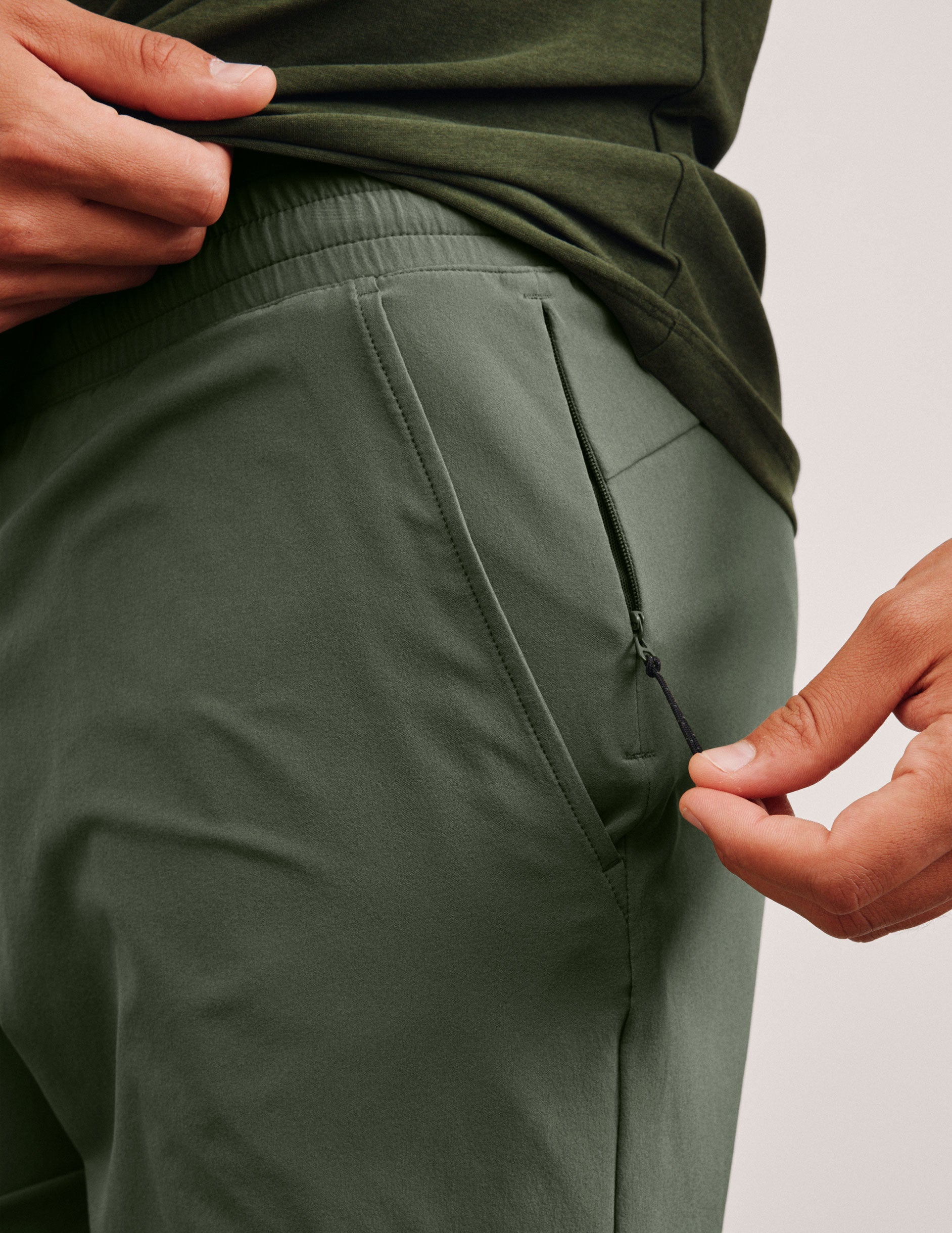 green men's 5" shorts on a plain background. 