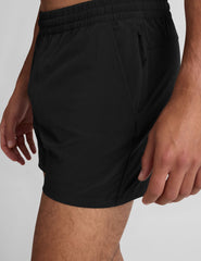 black 5" men's shorts on a plain background. 