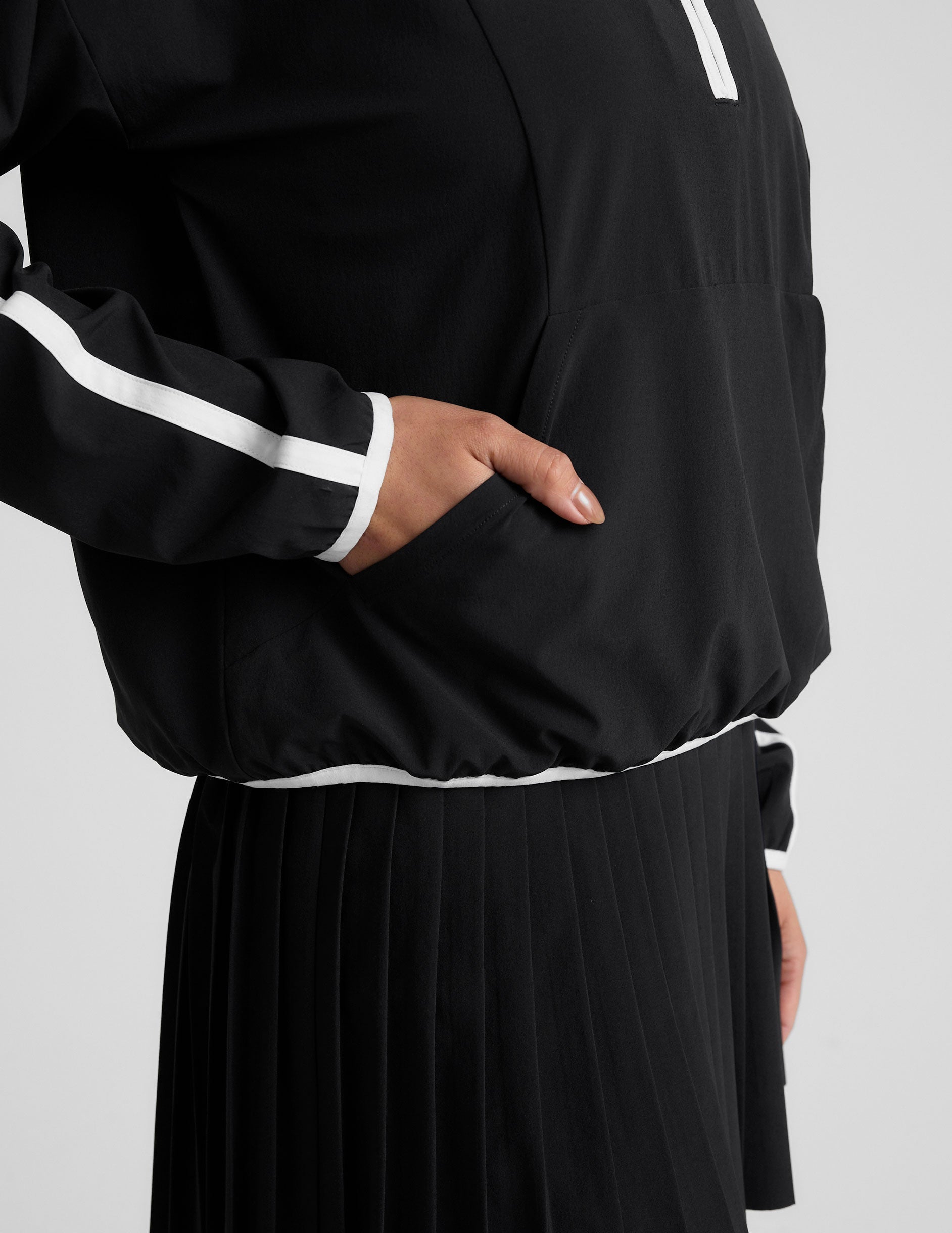 black and white half zip jacket